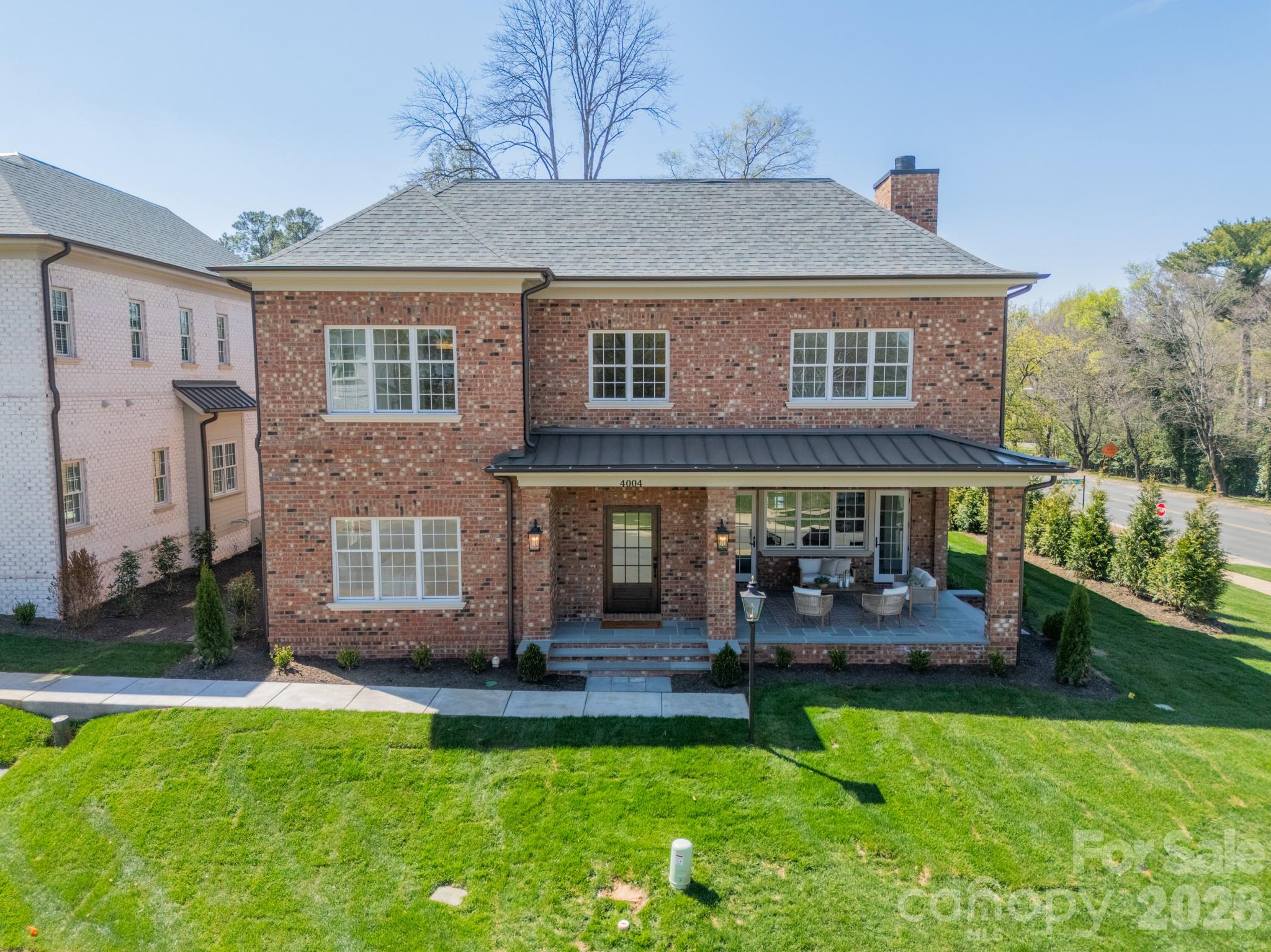 Designed for both elegance and ease, this all-brick home showcases exceptional quality craftsmanship and high-end finishes throughout. The open-concept floor plan offers refined yet comfortable living, with the primary suite on the main level providing privacy and convenience. Thoughtfully curated details — from designer lighting and custom millwork to premium flooring and upscale fixtures — elevate every space.

Enjoy true lock-and-leave convenience with landscaping included, allowing you to travel with peace of mind or simply spend more time enjoying nearby SouthPark’s premier shopping, dining, and amenities.

With its timeless all-brick exterior, and unbeatable location, this home offers the perfect blend of luxury, low-maintenance living, and sophisticated style.