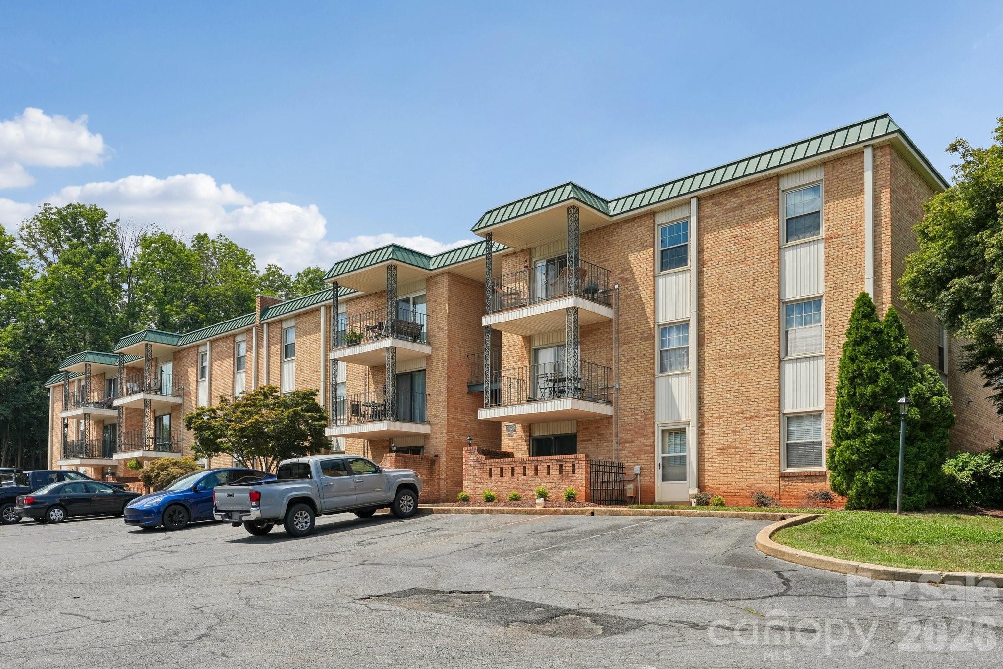 Welcome to Franciscan Terrace, one of Charlotte's hidden gems, perfectly situated just off Montford Drive and moments from Park Road Shopping Center. Tucked away this beautifully renovated, third-floor, 2-bedroom, 2-bath condo offers exceptional privacy, peaceful views, and an unbeatable location.

Step inside to discover a move-in-ready home featuring a stunning kitchen with quartz countertops, stainless steel appliances, engineered hardwood flooring throughout, and beautifully updated bathrooms with designer tile finishes. The convenient in-unit laundry makes everyday living even easier.

One of this home's most desirable features is its direct access to the Little Sugar Creek Greenway. Step outside and enjoy miles of scenic walking, running, and biking trails just moments from your door. Residents also enjoy a community pool and clubhouse, along with incredible walkability to Park Road Shopping Center and Montford Drive's renowned restaurants, coffee shops, breweries, and local favorites.

Whether you're looking for a low-maintenance lifestyle, a beautifully updated home, or one of Charlotte's most walkable neighborhoods, this private third-floor condo offers the perfect combination of comfort, convenience, and location.