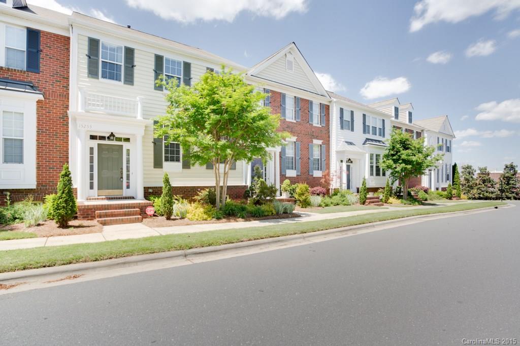 Move in ready 2BR/2BA/+2 Half Bath townhome in Ballantyne - Sterling Heights neighborhood. Prime location near shopping, dining, Interstate 485 & the Ballantyne Corporate Park. 3 levels with 2 Bedrooms/2 Full Baths on upper level. Main level features open floor plan, kitchen with island, dining, living with fireplace, half bath, & hardwoods. Lower level features office/bonus room, half bath, laundry & garage. Beautiful deck off main. Clean neutral finishes with fresh paint and new carpet.