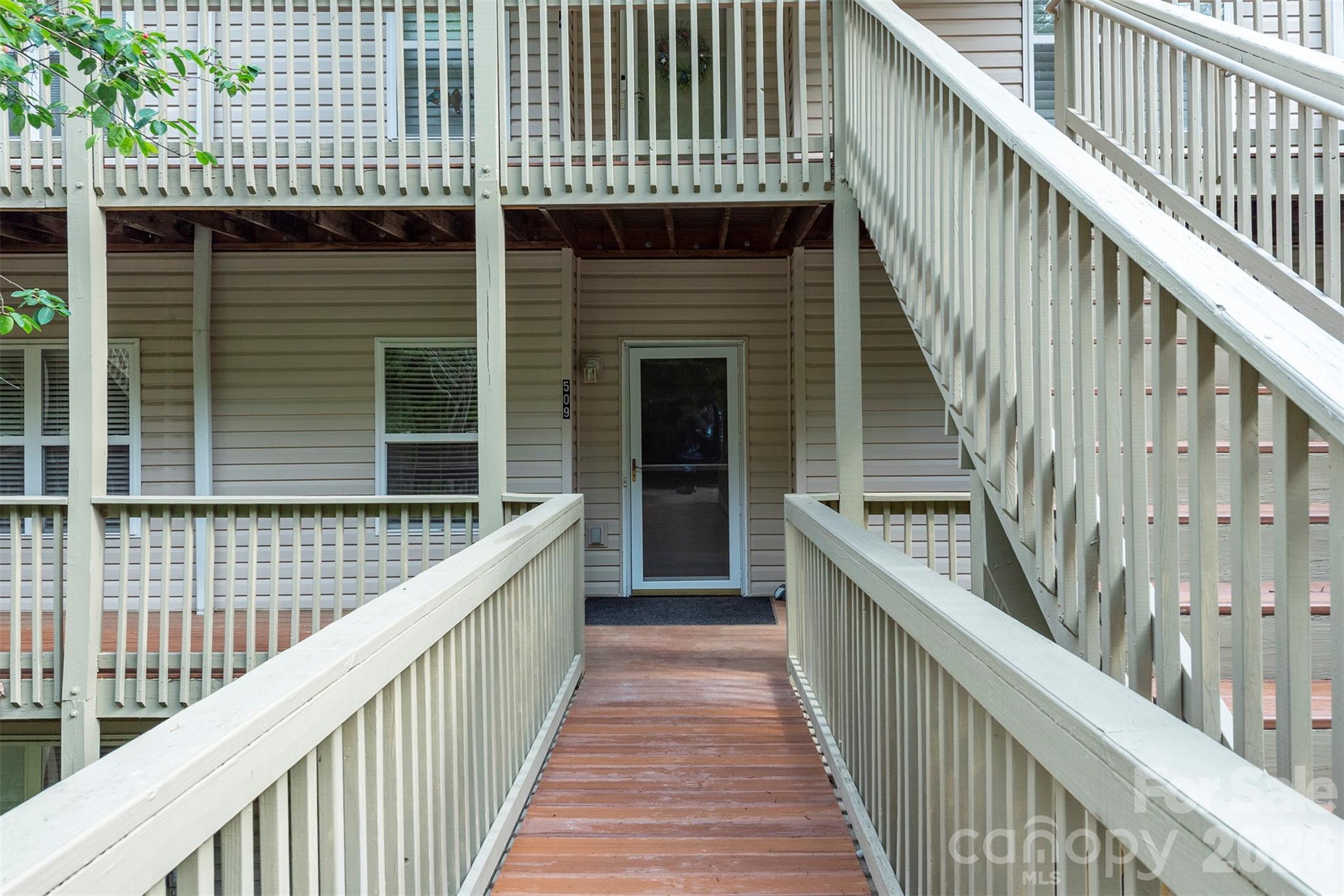 Enjoy easy, one-level living in this beautifully maintained main-level condo. This home has been meticulously maintained and thoughtfully updated throughout by the original owner. The kitchen features granite countertops, while the spacious living area offers new luxury vinyl plank flooring and a cozy gas fireplace. Recent improvements include a new HVAC system and a beautifully updated walk-in shower. Step outside to your private rear deck, the perfect place to enjoy morning coffee or unwind at the end of the day. An assigned parking space offers added convenience. Move-in ready and low maintenance.
