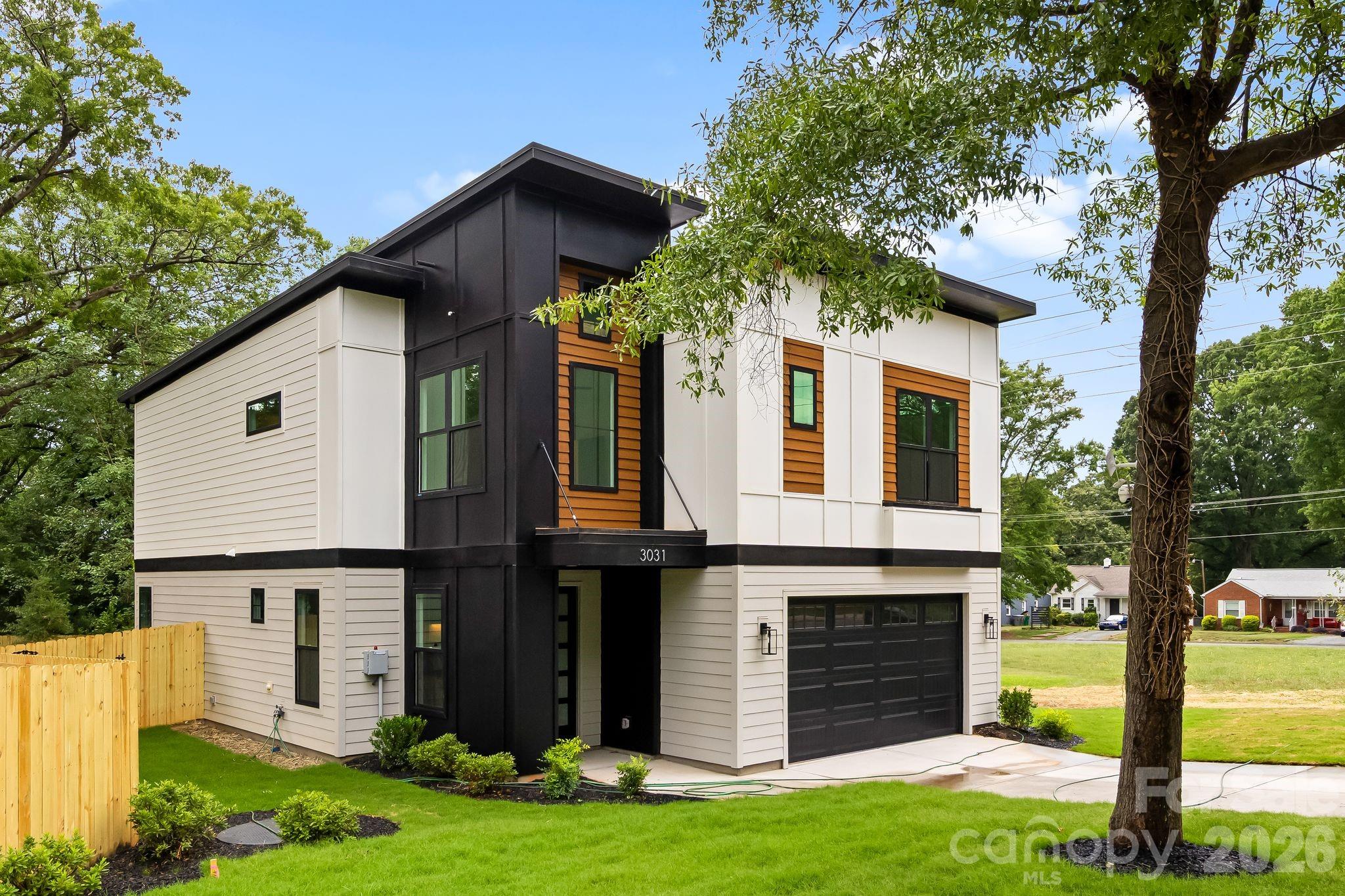 Enjoy prime Enderly Park location on a quarter acre lot in this brand new build and enjoy views of the park from the front yard. This beautifully designed modern residence is currently complete and move in ready, offering you the rare opportunity to be the first owner to enjoy this spectacular build from KO Construction. Step inside to an open, spacious living area that flows seamlessly into a large gourmet kitchen and dining space – perfect for entertaining. Elevated modern finishes impress at every turn: beautiful engineered hardwood floors throughout, custom-level tile in the kitchen and bathrooms, and sleek, high-end selections that elevate the entire home. All kitchen appliances are included! Prepare to be wowed by the expansive primary suite – an expansive retreat with generous space and luxurious details. The home features a convenient two-car garage, sodded front yard, and a fully fenced backyard. Complete with a builder warranty for complete peace of mind. Don’t miss your chance to own a brand-new home in one of Charlotte’s most desirable up-and-coming areas! Qualifies for First National Bank loan program incentives, please inquire for more details or to schedule a showing.