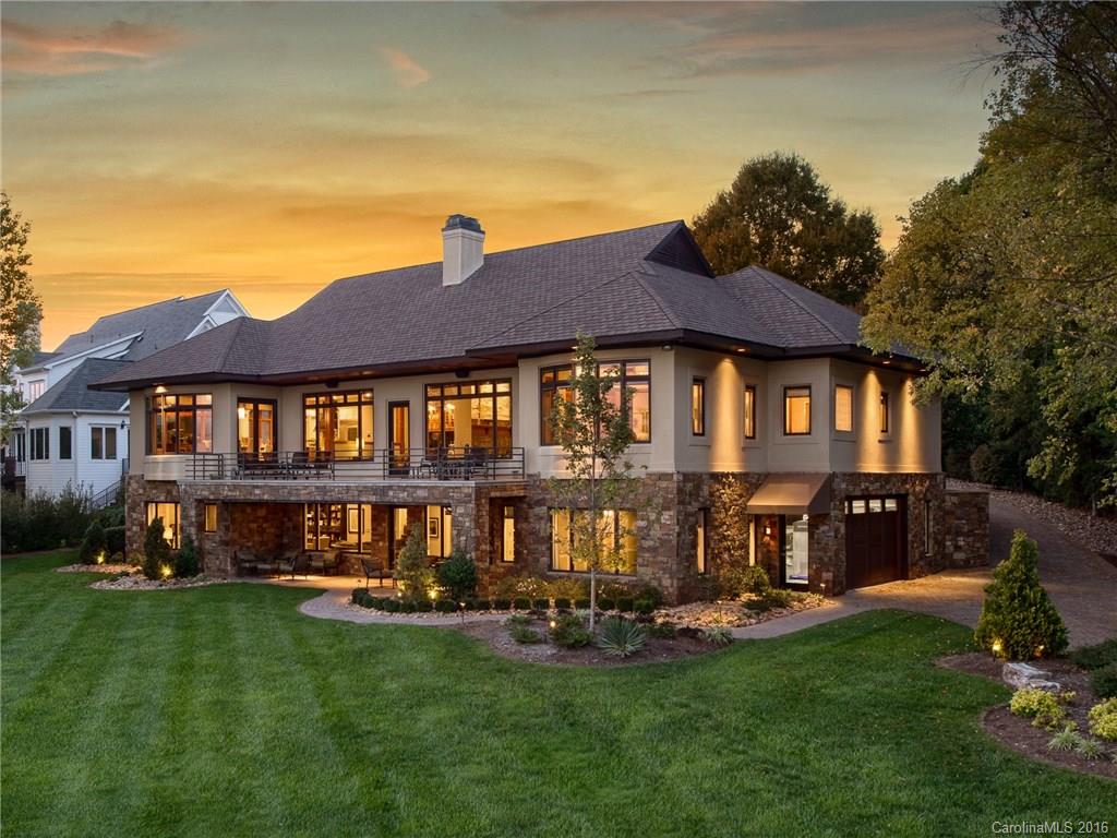 This brilliantly designed Smart Home in The Peninsula on Lake Norman is elite in every detail. Freshly updated featuring walls of picture windows overlooking priceless wide water & 190’ of uncluttered shoreline. Fine craftsmanship w/top of the line materials, state of the art automation & casual elegance abound. Artisan millwork, tongue & groove ceilings, chef’s kitchen w/huge island, honed granite, Wolf commercial range, SubZero & Bosch. 4 car heated/cooled garage-1 being utilized as full gym.