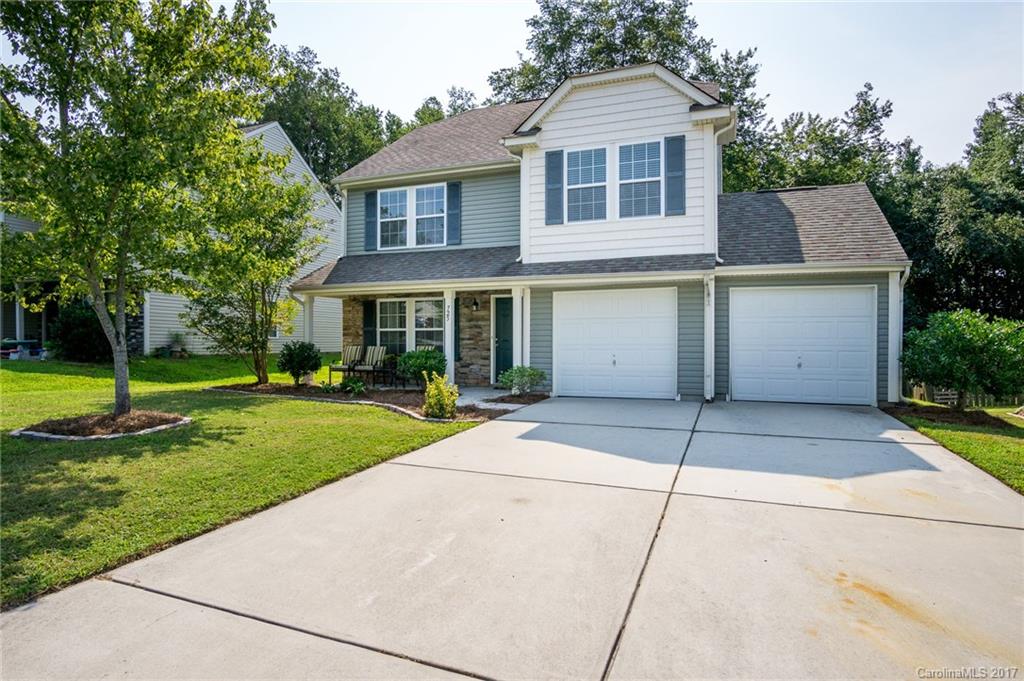 Absolutely lovely home in highly desired Wellsbrook sure to impress.  New Kitchen backsplash.  Hardwoods. OPEN FLOORPLAN! Rocking chair front porch.  Fenced yard.  Large master BR suite.  Community clubhouse with pool and playground.  Ponds.  Home warranty included.