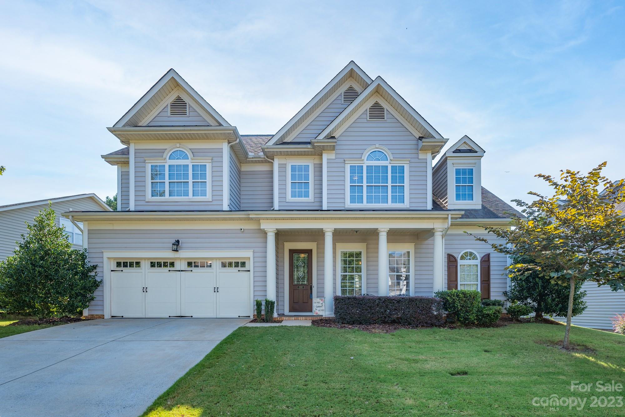 This home is move-in ready with a spacious primary bed/bath on main level, large family room, separate dining room, half bath, & eat-in kitchen area. Upstairs there are 3 bedrooms (one is large enough to be a bonus/den/office/playroom) & 1 full bath; there is also a 275+ sq. ft. unfinished storage space. NEW ROOF  installed Sept 5, 2023. The large kitchen has tile floor, granite countertop, tile backsplash, double oven, walk-in pantry and built-in desk area, overlooking the open 2-story family room with a stone gas fireplace. The backyard is level & completely fenced in with mature trees providing privacy. This neighborhood is in the highly sought-after Fort Mill School District & has sidewalks on both sides of the street, street lighting, 2 entrances in/out, large outdoor pool with airnasium, playground & pickleball court. As of Sept, PKMS is on an enrollment freeze-check with FMSD for details if this is important to you.