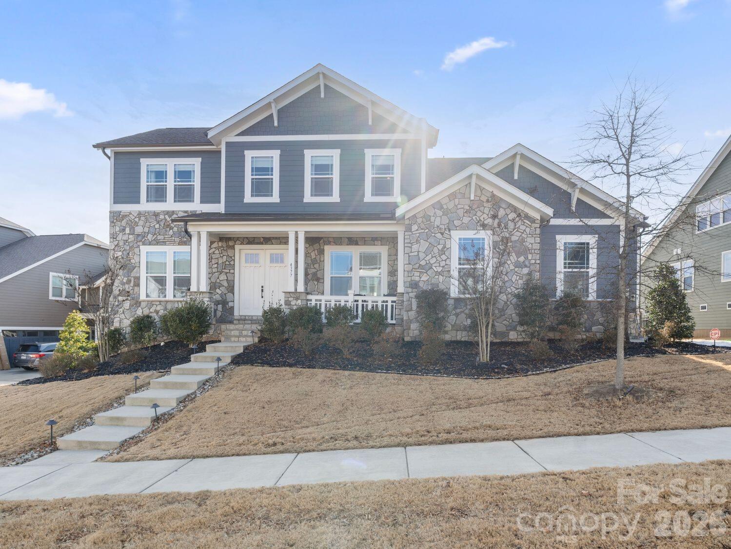 Welcome to 4377 Upcountry Ct, a stunning Fielding home in the highly sought after Masons Bend community where everyday living feels like a private wellness retreat. Thoughtfully designed and impeccably maintained, this 5 bedroom, 4.5 bath residence offers 4,488 square feet of elevated living with exceptional indoor/outdoor flow.

The backyard is truly one of a kind, featuring a resort style pool and spa, built in sauna, and beautifully curated outdoor living spaces perfect for unwinding, entertaining, or enjoying peaceful Carolina evenings at home. Inside, you will find spacious living areas, abundant natural light, and a flexible floor plan ideal for both everyday life and hosting guests.

The chef’s kitchen anchors the home with ample cabinetry, generous counter space, double islands, and seamless connection to the main living area. A main level bedroom suite offers convenience for guests or multigenerational living, while the upper level includes generously sized secondary bedrooms and a luxurious primary suite designed for comfort and relaxation. The upgrades in this home are unparalleled! 

Located on a quiet cul de sac in Masons Bend, this home offers access to top tier community amenities, scenic trails, and easy proximity to Fort Mill schools, dining, and shopping. This is more than a home. It is a lifestyle.
