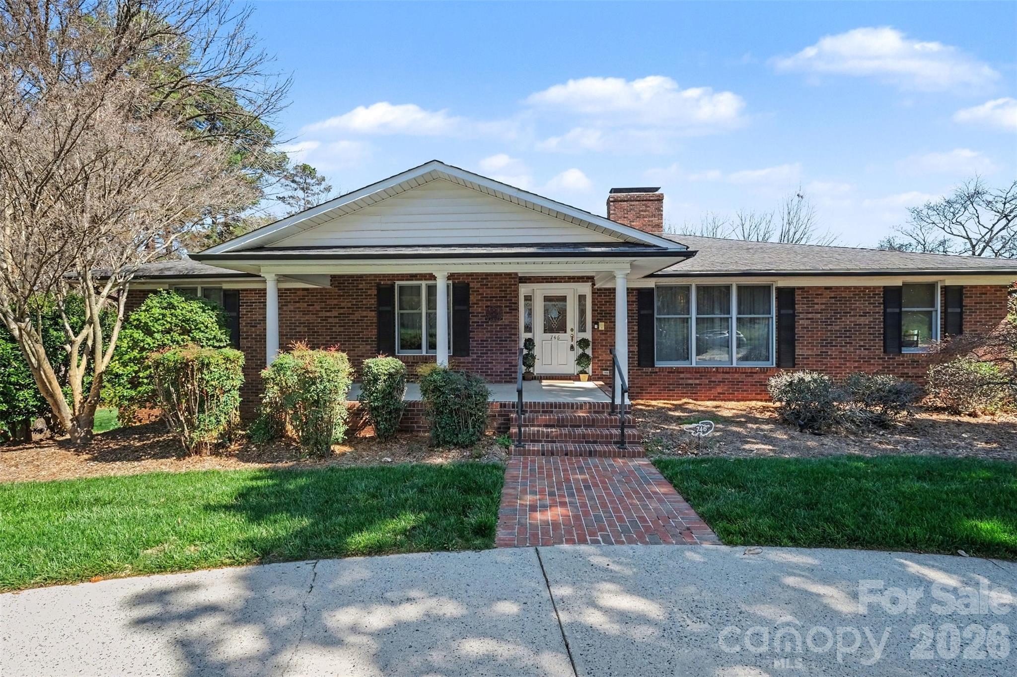 Welcome to your timeless elegant home! This brick house is nestled in the lovely Beverly Hills subdivision, it is a corner lot, located conveniently near Atrium Hospital, Carolina Mall and I-85. This home is made for hosting plenty of family, friends and neighbors.  The home truly has two main floors, there are two full kitchens; one upstairs, one in the lower level. To the side of the upper kitchen is a breakfast area and formal dining.  There is a great room with a gas fire place and plenty of siting/family open areas.   The house has 2 bedrooms, 3 full bathrooms upstairs with the primary bedroom located upstairs.  The Primary Bedroom has 3 walk in closets!  There is a built in library and office upstairs.  Laundry room is located on the lower level and there is a laundry chute in the upper level. The lower level has 2 bedrooms, 1 full bathroom.  Plenty of closet and storage space in the bedrooms.  There is an exercise room with plenty of storage space for luggage or seasonal decorations.    In the middle of the lower area is a gorgeous wood burning fire place with a pool table, there is also a family room area.  Off to the side of the house there is a detached workshop shed with a garage door. The house is wrapped around a beautiful green yard, that has a sprinkler system that will help you keep the grass green. This home is waiting for you to love it, live in it and share laughter! (Please note the curtains in the formal dining area do not convey, the light fixture on the ceiling in the lower level tv/family room does not convey.)