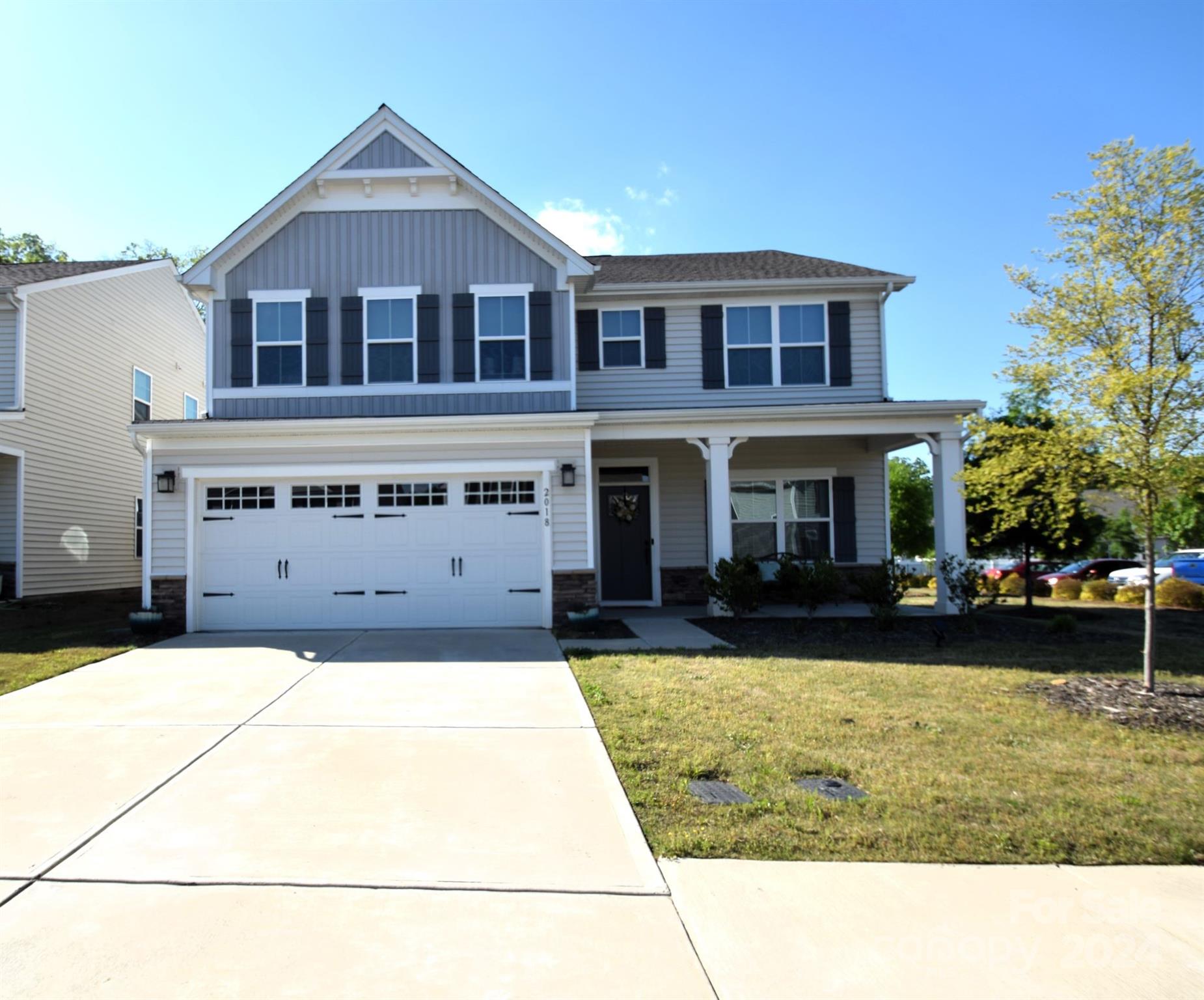 This delightful home offers a perfect blend of comfort, style, modern convenience, and community amenities. As you step inside, you're greeted by a spacious living area with ample natural light. The open layout seamlessly connects the living room to the kitchen making it ideal for entertaining guests or simply enjoying family time. The gourmet kitchen boasts quartz countertops, stainless steel appliances, gas range and oven with an additional electric oven. Adjacent to the kitchen, a cozy dining area provides the perfect spot for intimate meals with loved ones. The 2nd floor offers a large loft as well as a tranquil primary suite, featuring 2 walk-in closets, a luxurious en-suite bathroom with a soaking tub and separate shower. Additional bedrooms offer comfortable accommodations for family members or guests, each with its own unique charm. Outside, the backyard beckons for outdoor enjoyment, whether it's hosting summer barbecues, playing with pets, or simply relaxing in the fresh air.