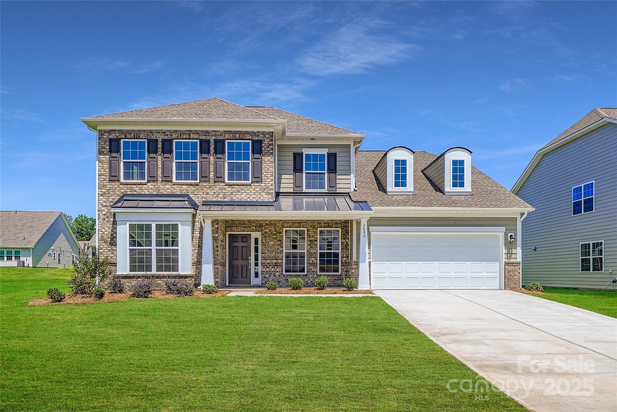 The Franklin is a new two-story home that provides ample space for the whole family to thrive. The first floor features an open design among the family room, kitchen and breakfast room, plus a formal living and dining room, a covered patio, a luxe owner’s suite and a secondary bedroom. The second floor hosts three secondary bedrooms with walk-in closets and a loft and a bonus room that add shared-living space. Plus, our signature Everything's Included program means you will get a gourmet kitchen with double ovens and cooktop, quartz or granite kitchen countertops, subway tile backsplash, ceramic tile, luxury vinyl plank flooring, and a gas fireplace (per plan) at no extra cost! Harris Mill located in a sought-after Indian Land, offers luxury homes and quarter acre and wooded homesites. Homeowners will enjoy nearby proximity to great shopping and dining at the Promenade at Carolina Reserve, Waxhaw, and Ballantyne.