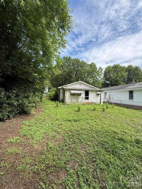 INVESTOR ALERT! This charming, original-condition property at 1622 W Park Ave in Albemarle, NC, is a true investor's dream, offering boundless potential for a profitable flip or a long-term rental hold. Built in 1938, this 2-bedroom, 1-bathroom house sits on a generous 0.17-acre lot and is ready for a complete transformation. The interior offers a compact, efficient layout of 864 square feet, serving as a perfect blank canvas for modern updates. A highly desirable feature is the detached 2-car garage, which presents an excellent opportunity for renovation to significantly boost the property's appeal and value. Bring your vision and capitalize on this outstanding rehab opportunity in Albemarle. Property conveys "as-is."