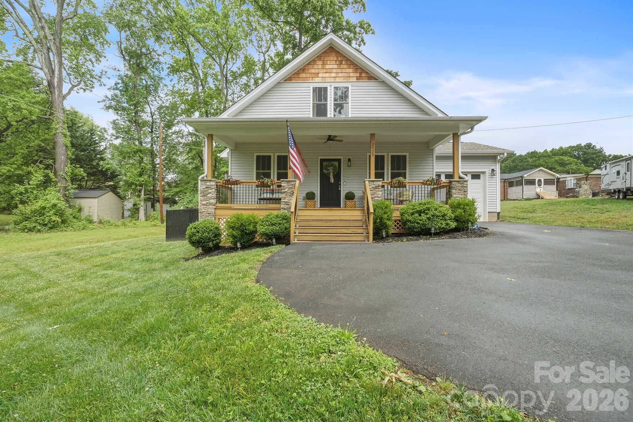 Looking for newer construction in town? This one is available! Built in 2022, this well-maintained home offers modern comfort and a convenient in-town location. The main-level primary suite features a walk-in shower and dual sinks. Covered front porch with a beautiful view, accented by stacked stone columns that add great curb appeal.
The home includes a one-car garage and a fully fenced backyard—perfect for pets, entertaining, or added privacy. Inside, you’ll find durable LVP flooring on the main level and carpet upstairs. The kitchen is equipped with granite countertops and a spacious island. Conveniently located near the hospital, shopping, and restaurants. Don’t miss your chance to make it yours!