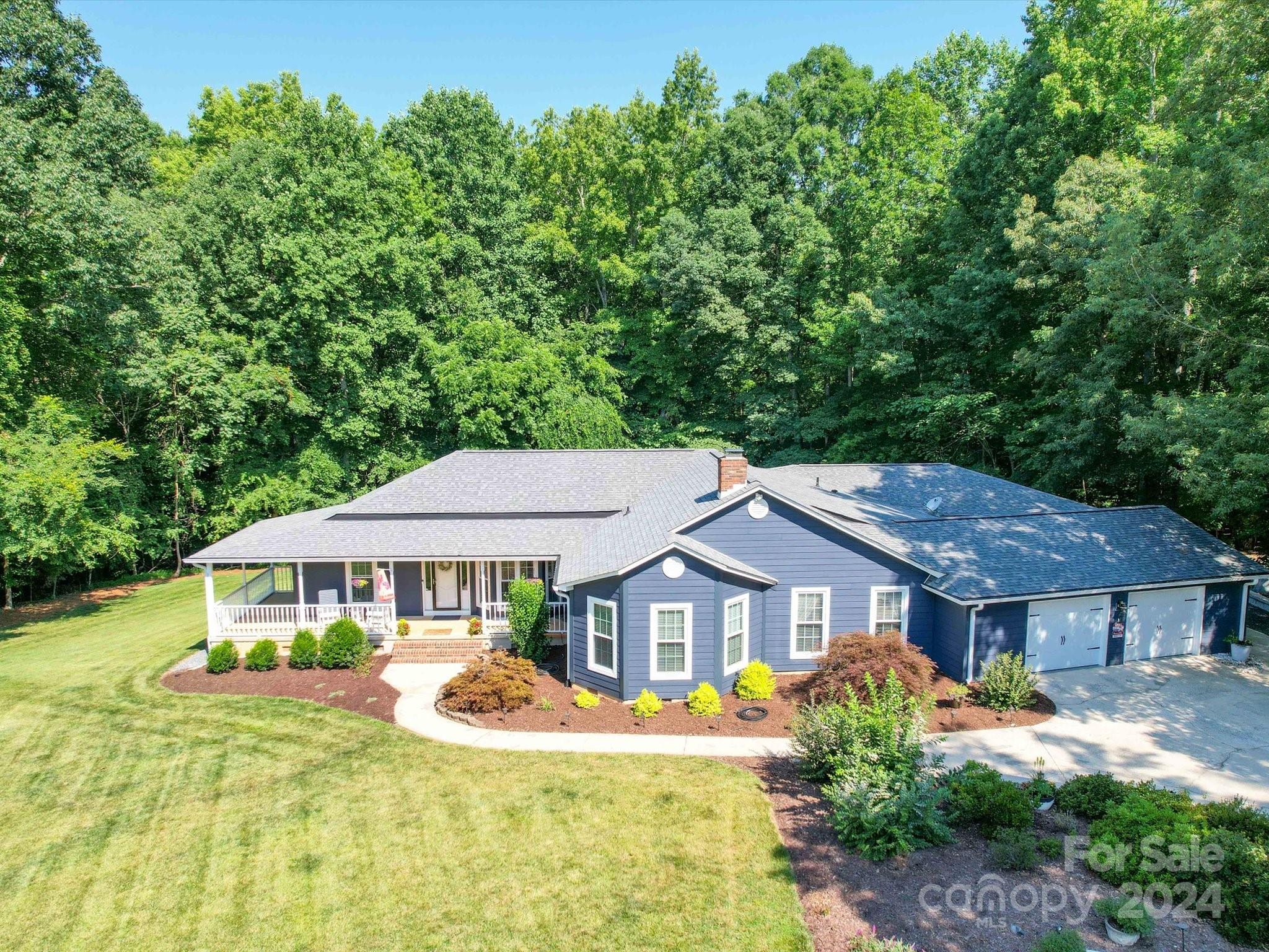 If you are looking for a single level Home in the Clover area with 2+ acres and no HOA then this may be the property for you! This tastefully decorated home is located in the Amber Ashyln Acres and features 4 Bedrooms, Recreation Room, office and 3.5 Bathrooms.  This home has approximately 4056 Heated square feet. Open Kitchen features Quartz countertops, Island/Breakfast bar, Tile backsplash, walk-in pantry and stainless steel appliances. Fiber Cement exterior siding. Formal Dining room and Breakfast Area. Wonderful Split Bedroom Plan that features dual primary bedrooms. Tile Floor used throughout the house except in the recreation room and Primary Bedroom Closet. Plenty of space for outdoor entertaining with large rear deck and covered front and side porches. New Well pump and Pressure tank installed 6/2024.  Crawl Space encapsulation installed 2022. Tankless gas water heater installed 2022. Garage Floor had epoxy paint installed 3/2024. Do not miss the opportunity to see this home!