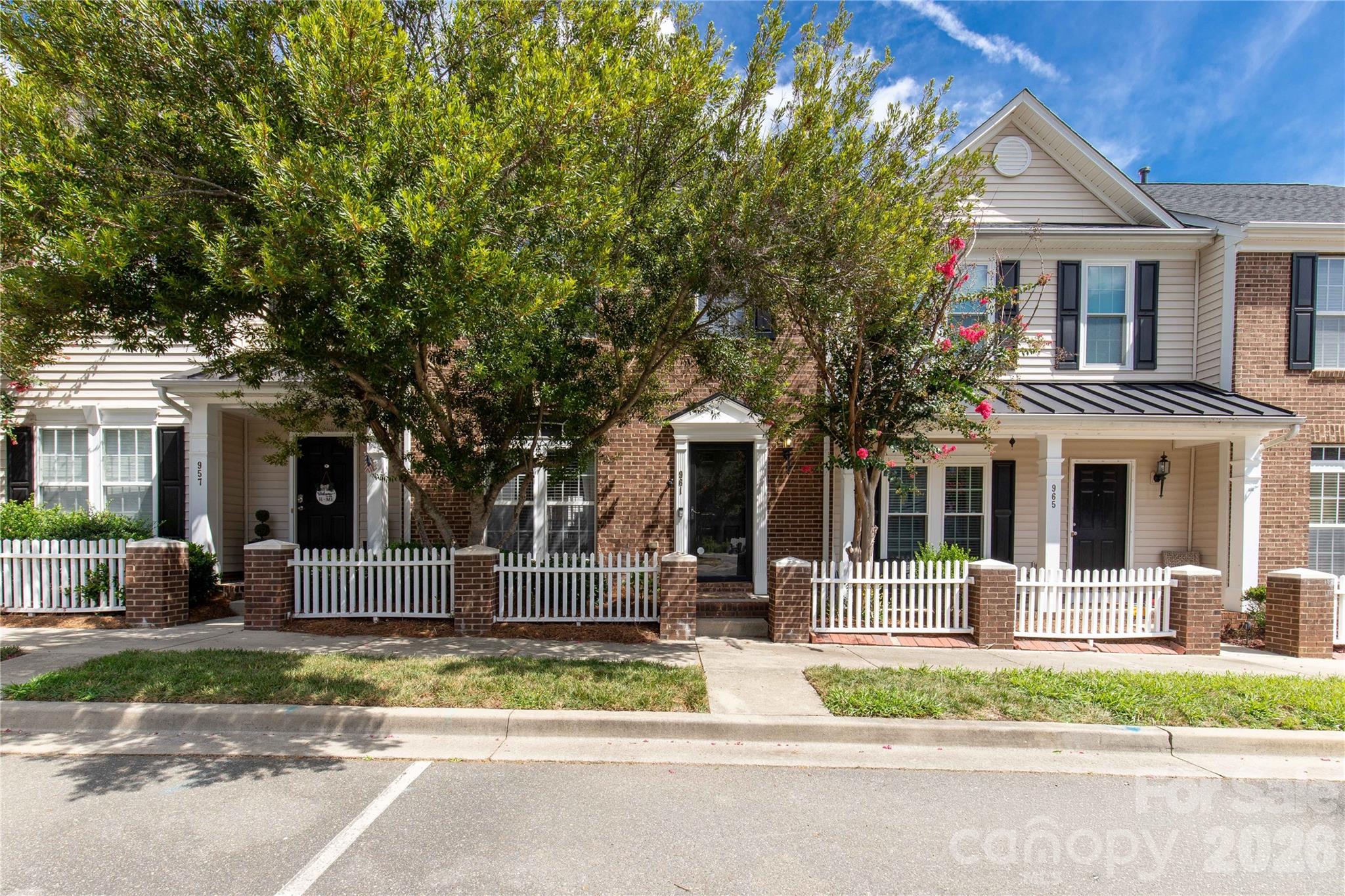 Step into this beautifully updated townhome featuring stylish, modern finishes and thoughtful design throughout. From the moment you enter, you’ll notice eye-catching details like sliding barn doors, decorative wall accents, and upgraded lighting that create a warm and inviting atmosphere.

The kitchen is a standout, offering newer stainless steel appliances, a classic subway-tile backsplash, and distinctive white granite countertops—perfect for both everyday living and entertaining. The spacious great room provides plenty of room for gatherings, while the sunroom offers a peaceful retreat filled with natural light.

Upstairs, you’ll find two generously sized bedrooms, each with its own bathroom for added comfort and convenience. Outside, enjoy a private patio with a pergola—ideal for relaxing or hosting—with ample space for grilling.

Additional features include a smart thermostat and video doorbell for modern convenience. This move-in-ready home combines comfort, style, and functionality—schedule your showing today before it’s gone.