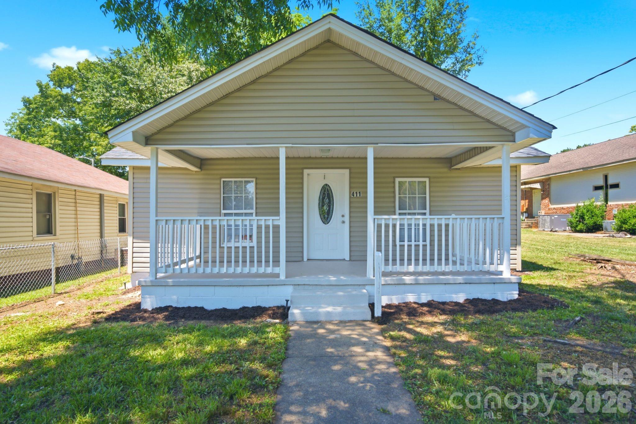 Welcome to 411 Weathers Street in Shelby! This beautifully renovated 3-bedroom, 1-bath home offers the perfect blend of modern updates and small-town charm. Completely remodeled from top to bottom, this move-in ready home features a new roof, HVAC system, water heater, windows, electrical, plumbing, flooring, kitchen, bathroom, and more. The open-concept living area creates a bright and inviting space.

Situated on a spacious lot with a covered front porch and mature shade trees, this property provides both comfort and convenience. Located just minutes from Uptown Shelby's restaurants, shopping, parks, and entertainment, this home offers an excellent opportunity for first-time homebuyers, downsizers, or investors seeking a turnkey property.

Shelby continues to experience significant economic growth with major manufacturing investments, infrastructure improvements, and ongoing redevelopment throughout Cleveland County, making it an increasingly desirable place to live and invest. Recent announcements include a $380 million manufacturing investment expected to create more than 100 jobs in Shelby, along with continued public infrastructure and downtown revitalization projects throughout the area.

Don't miss your opportunity to own this fully renovated home at an affordable price point!