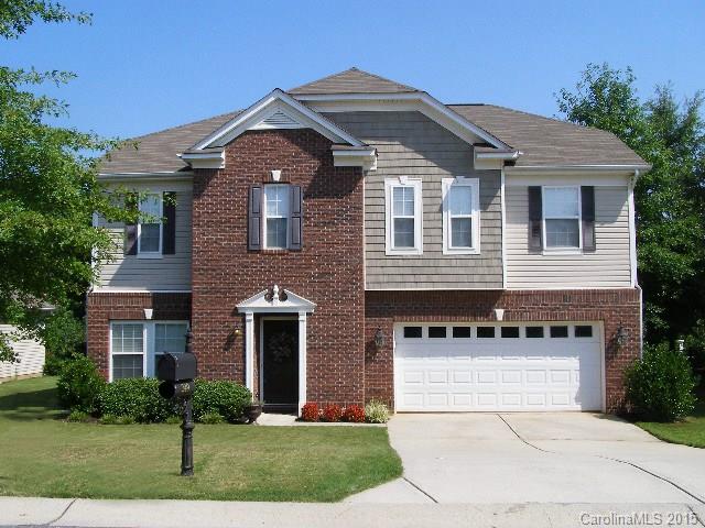 Spacious home and Ft Mill Schools! Open floor plan w/ hardwoods in Living/Dining Room area & Kitchen/ Breakfast. Great Room has fireplace. Bedroom & full bath on main is perfect for guests. Huge upstairs Loft area + Master, 2 bedrooms & laundry. Master Bath has dual sinks, garden tub & separate shower + deep WIC. 42 inch cabinets and corian counters in Kitchen, refrigerator incl. Rear porch looks out over natural area. Great location w/ easy access to interstate. COMMUNITY POOL & TENNIS COURTS.