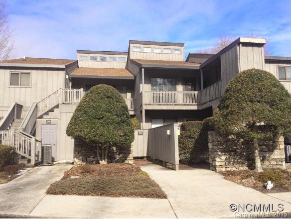 Enjoy one level living in this well-maintained & spacious 1st floor condo w/2BR-2BA, living room w/wood-burning stone fireplace & dining area, wonderful kitchen, ample closets for storage, screened-in porch w/lovely park view + separate side patio. Outdoor storage/utility shed. Detached one-car garage w/new metal door. 2009 hot water heater. Next to Laurel Park & convenient to shopping, restaurants, medical & Downtown Hendersonville.