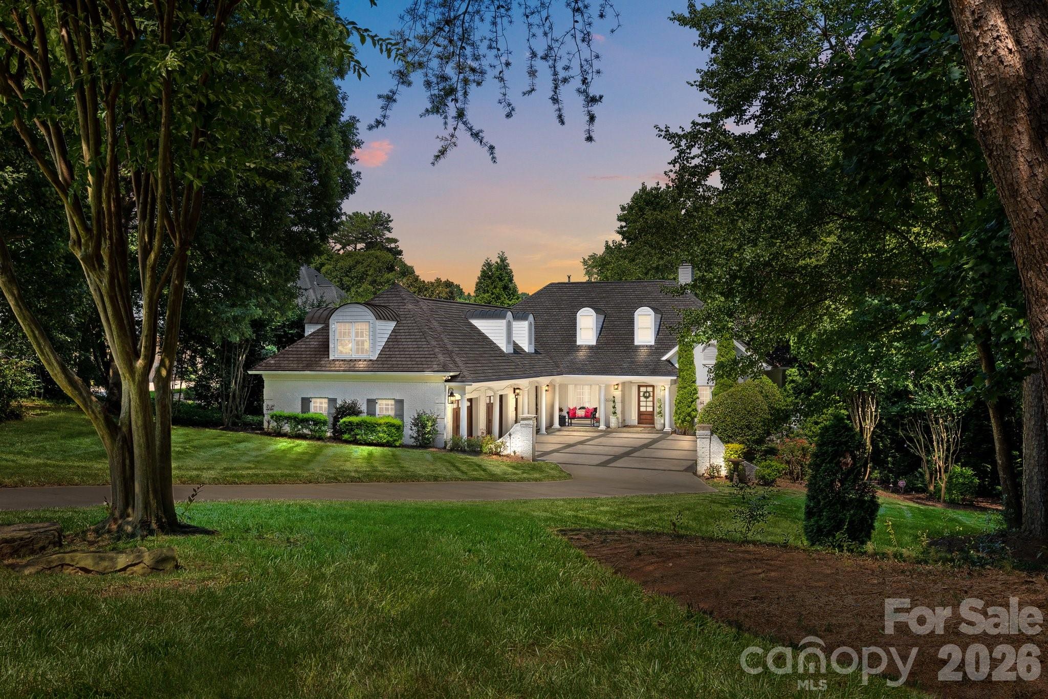 Welcome to 19506 Mary Ardrey Circle, an exceptional waterfront estate in the prestigious Patricks Purchase community on Lake Norman, where a truly private oasis awaits. Set on an expansive, meticulously landscaped waterfront lot, this beautifully renovated residence offers refined luxury, thoughtful design, and seamless indoor-outdoor living. The open floor plan is enhanced by custom millwork and a gourmet kitchen appointed with Viking and Sub-Zero appliances, flowing effortlessly into inviting living spaces. The luxurious primary suite features a private balcony overlooking the lake and a spa-inspired bath, while an additional bedroom with an en suite bath and a dedicated home office complete the main level. Upstairs, a spacious bonus room or additional bedroom provides ideal flexibility. The lower level is designed for both relaxation and entertaining, offering two additional bedrooms with en suite baths, a recreation room, exercise room, and dining area. Outdoors, enjoy a resort-style setting with a sparkling pool, putting green, covered living area, and tranquil, panoramic views of Lake Norman. This is a rare opportunity to own an extraordinary waterfront retreat that embodies privacy, elegance, and elevated lakefront living.