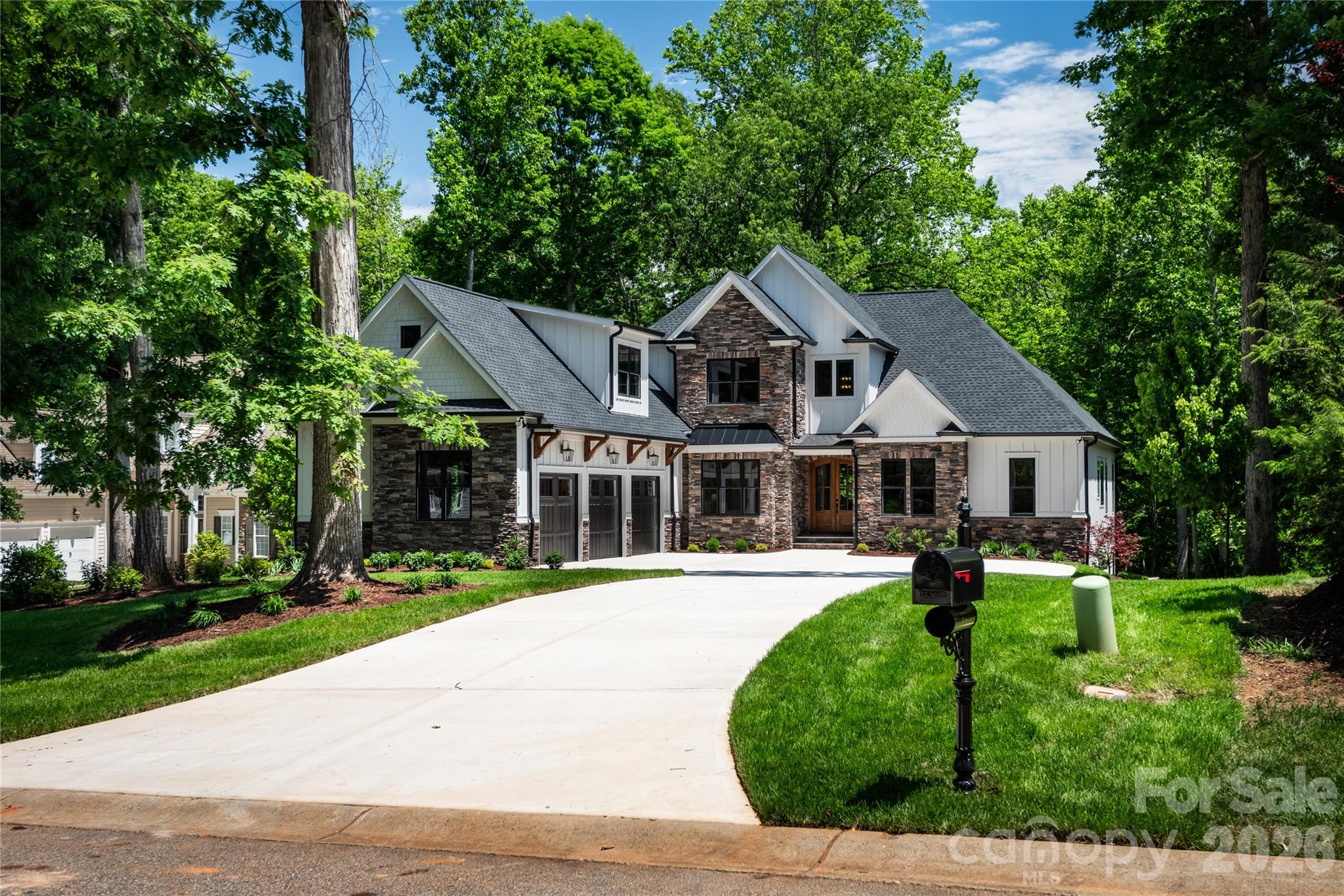 Welcome to luxury lake living in the private Lakewood subdivision on Lake Norman.
This exceptional new construction custom home offers approximately 3,900 square feet
of thoughtfully designed living space, combining elevated finishes with functional
design.
Featuring 4 spacious bedrooms and 4 full bathrooms, this home is perfectly suited for
both everyday living and entertaining. The primary suite is located on the main level,
offering a true retreat with large his and her custom built walk-in closet and a spa-
inspired bathroom complete with a zero-entry shower, freestanding soaking tub, and
heated tile floors for ultimate comfort.
The open-concept main living area is anchored by a stunning floor-to-ceiling fireplace,
creating a warm and inviting focal point. The gourmet kitchen flows seamlessly into the
dining and living spaces and is complemented by a large walk-in pantry for ample
storage. Just off the garage entry, a convenient drop zone keeps everyday life
organized and clutter-free. A dedicated office on the main level provides the perfect
space for working from home or quiet study.
Upstairs, you'll find additional bedrooms along with a spacious bonus room and an
adjoining loft area-ideal for a secondary living space, media area, or playroom.
Step outside to the covered rear porch, perfect for relaxing or entertaining while
enjoying the privacy of this desirable community. The backyard offers ample space to
design and build your dream pool, creating the ultimate outdoor oasis. A 3-car garage
adds both convenience and extra storage.
Additional features include a tankless gas water heater for energy efficiency and
continuous hot water.
Located in a quiet, sought-after neighborhood, this home includes access to gated boat
storage in the community with the boat launch less than 0.4 miles away-making it easy
to enjoy everything Lake Norman has to offer.
Estimated completion: November 2026.
This is a rare opportunity to own a beautifully crafted luxury custom home with premium
finishes and beautiful features in one of the most desirable private lake communities.