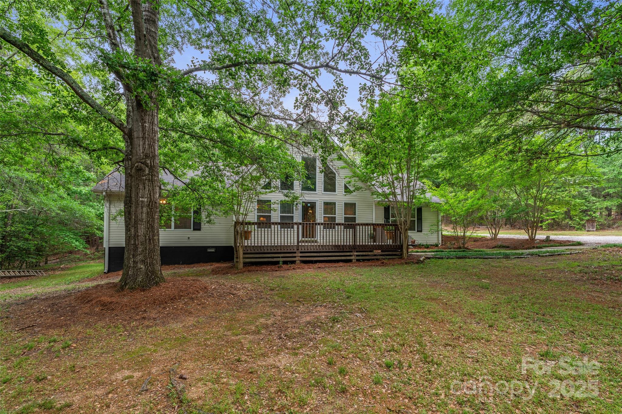 This is the hidden gem you’ve been waiting for—over 3 wooded acres of peace, privacy, and possibility. With 1700+ sq ft of living space, a wired workshop, and a massive covered RV/boat storage area, this property isn’t just a home—it’s a dream setup. Bring your toys, your tools, and your vision—there’s room for all of it here. Tucked away in the trees, you’ll feel miles from everything while still being conveniently located. No HOA, no restrictions—just freedom to live how you want. Whether you’re crafting your next project in the workshop, sipping coffee surrounded by nature, or finally having the space to roam, this home makes it all possible. So close to Rock Hill while still still feeling like you’re out in the country. Opportunities like this don’t come around often—especially at this price.