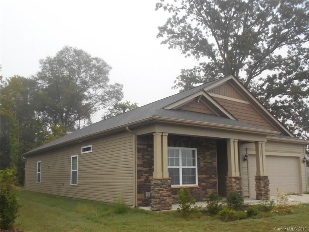 Multiple Offers. Seller Requests Highest and Best offers by end of day on 11/3/2016. Beautiful ranch style home with open floor plan in Steele Creek.  Vinyl siding with stone on front with a covered front porch and a back patio. Many upgrades including Cherry cabinets, granite counter tops and stainless steel appliances including a double door refrigerator. French doors lead to office or could be used for 4th bedroom. Garden tub with separate shower in master bath.