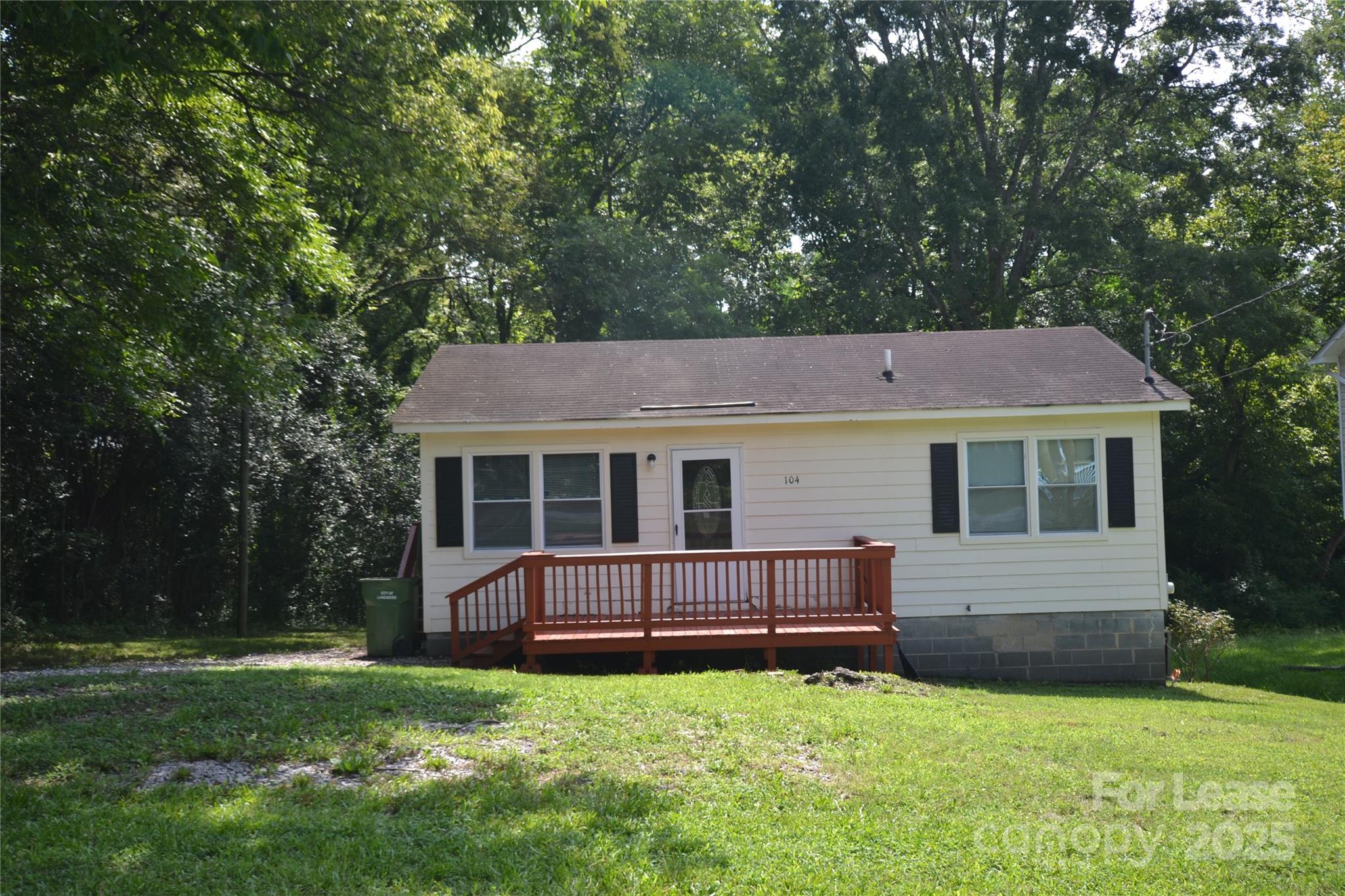 Cute Ranch home in Lancaster, SC. Convenient to shopping and restaurants. This home has a large family room with gracious opening to the kitchen area with access to the side yard, kitchen has 2 spaces, additional space has refrigerator and electric range as well as washer and dryer hookups. Two Bedrooms and common hall bathroom. Great private backyard with lots of space. Pets are conditional and must be approved.