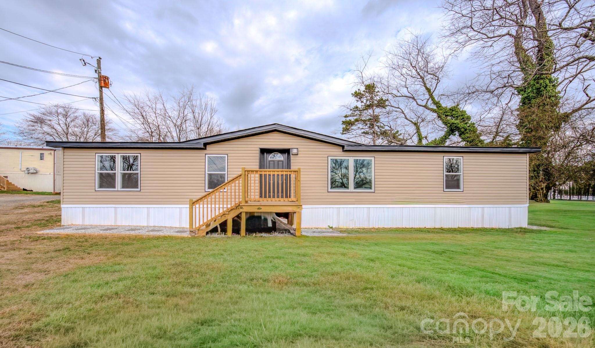 UPDATE: Appliances are not currently installed. Seller will install new appliances prior to closing. (Washer/Dryer & Refrigerator) 

Welcome to this beautifully renovated home in the heart of Candler, where comfort, value, and convenience come together seamlessly. This 3 bedroom, 2 bathroom home offers 1,440 square feet of thoughtfully updated living space, perfect for buyers looking for a move-in ready opportunity without the stress of renovations.

Step inside to a refreshed and inviting living area designed for everyday comfort and easy entertaining. Major upgrades have already been taken care of, including a brand new HVAC system, new roof, new siding, new decks, and new fencing, giving you peace of mind for years to come.

Situated on a spacious 0.44 acre lot, the property provides the perfect balance of privacy and usability, whether you are looking to relax, entertain, or enjoy outdoor space. The cozy feel of the home combined with its modern updates creates a welcoming environment ideal for first-time buyers or anyone seeking a low-maintenance lifestyle.

Located just 14 minutes from Patton Avenue, you will enjoy quick access to shopping, dining, and everyday essentials, while still being tucked away in a growing and desirable area of Candler. With continued development and exciting growth in the area, this is a great opportunity to secure a home in a location with strong future potential.

If you have been searching for an affordable, updated home in a convenient location, this one is worth a look. Schedule your showing today and come see the value for yourself.