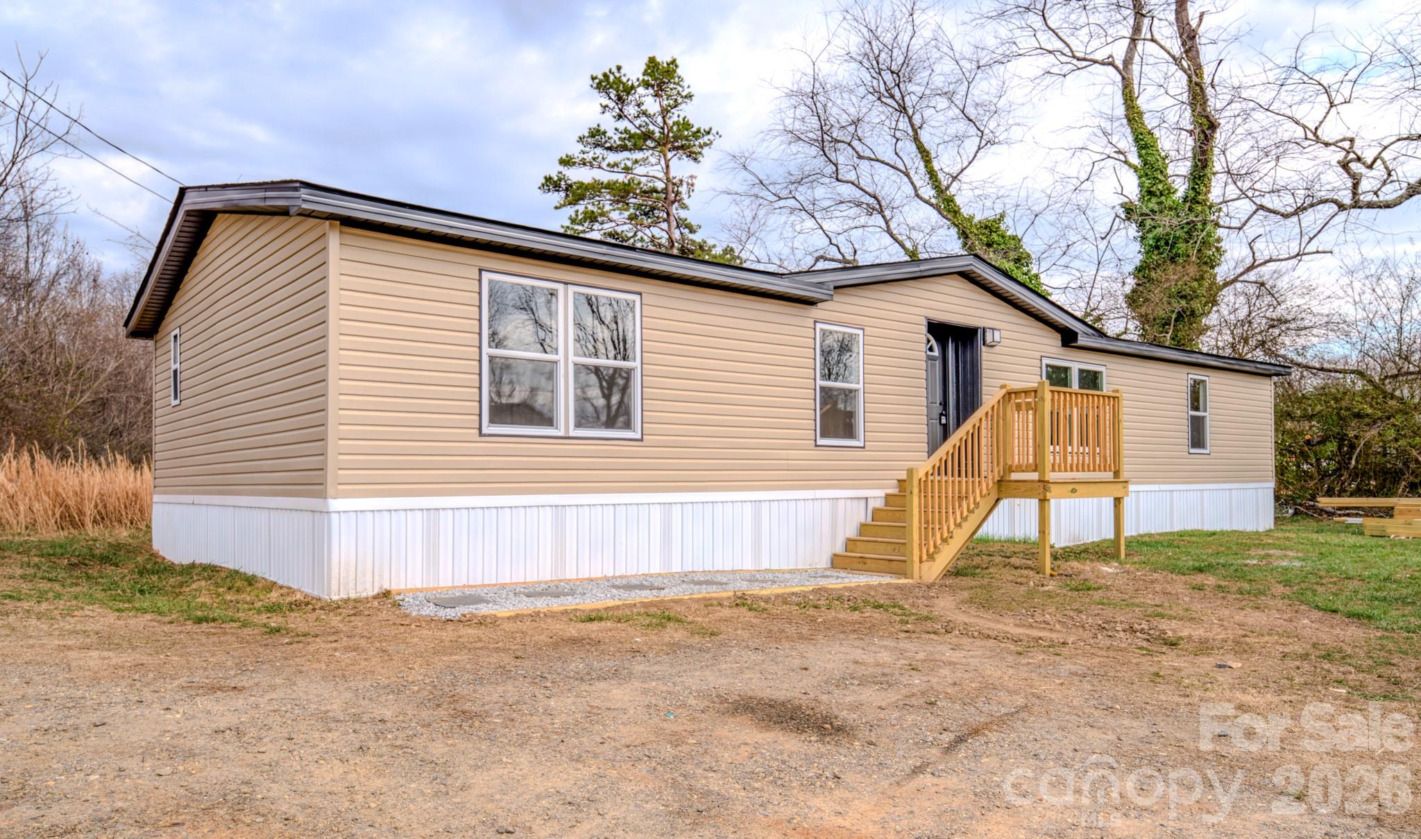 UPDATE: Appliances are not currently installed. Seller will install new appliances prior to closing. (Washer/Dryer & Refrigerator) 

Welcome to this beautifully renovated home in the heart of Candler, where comfort, value, and convenience come together seamlessly. This 3 bedroom, 2 bathroom home offers 1,440 square feet of thoughtfully updated living space, perfect for buyers looking for a move-in ready opportunity without the stress of renovations.

Step inside to a refreshed and inviting living area designed for everyday comfort and easy entertaining. Major upgrades have already been taken care of, including a brand new HVAC system, new roof, new siding, new decks, and new fencing, giving you peace of mind for years to come.

Situated on a spacious 0.44 acre lot, the property provides the perfect balance of privacy and usability, whether you are looking to relax, entertain, or enjoy outdoor space. The cozy feel of the home combined with its modern updates creates a welcoming environment ideal for first-time buyers or anyone seeking a low-maintenance lifestyle.

Located just 14 minutes from Patton Avenue, you will enjoy quick access to shopping, dining, and everyday essentials, while still being tucked away in a growing and desirable area of Candler. With continued development and exciting growth in the area, this is a great opportunity to secure a home in a location with strong future potential.

If you have been searching for an affordable, updated home in a convenient location, this one is worth a look. Schedule your showing today and come see the value for yourself.