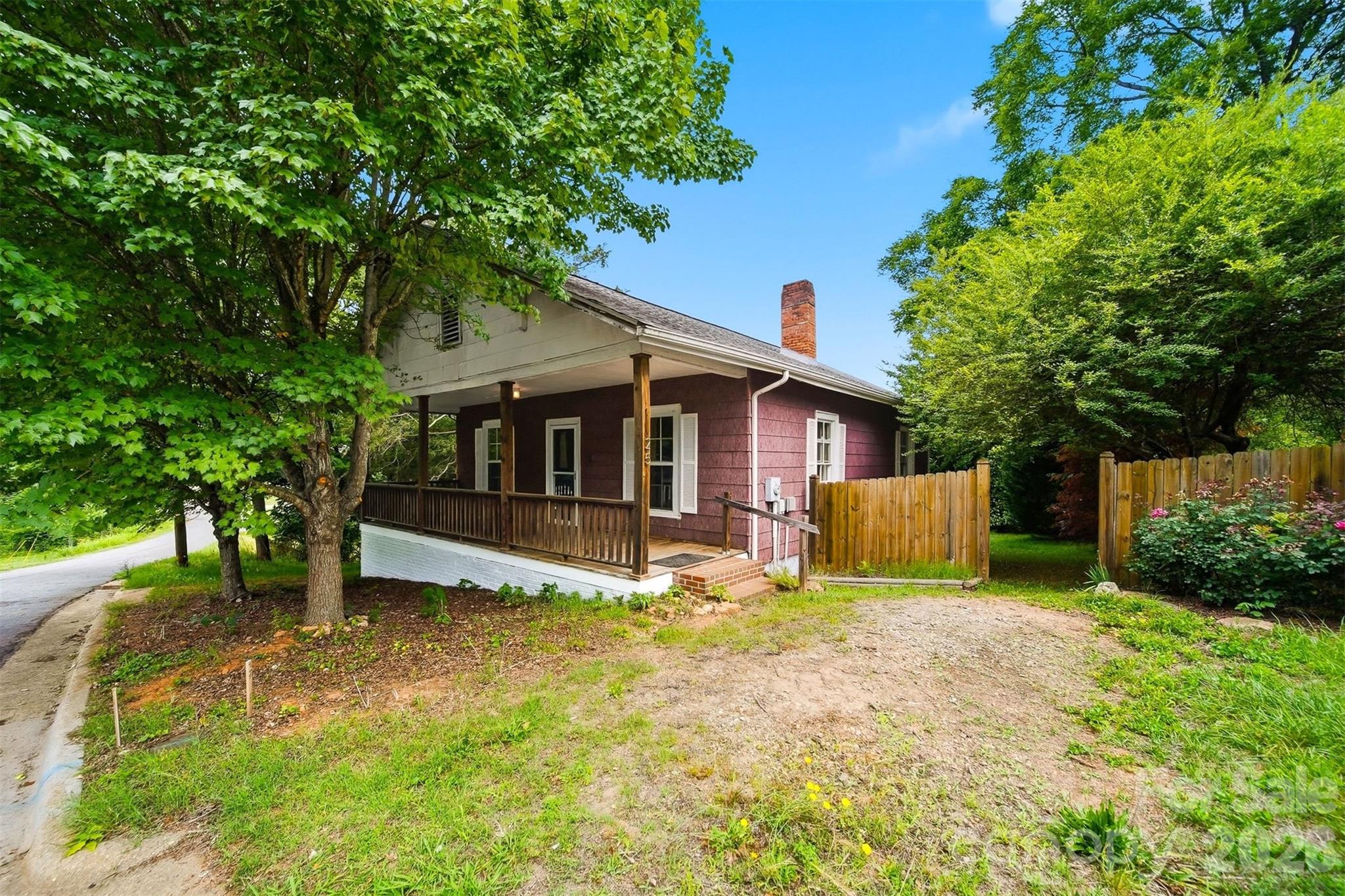 Welcome to this charming in-town bungalow bursting with character and timeless appeal! Relax on the inviting covered front porch and step inside to discover beautiful hardwood floors, warm tongue-and-groove walls, and cozy living spaces filled with charm. The thoughtfully designed interior offers the perfect blend of comfort and vintage character, while the bathroom features a classic clawfoot tub.  Conveniently located close to shopping and dining this delightful home offers the charm of yesteryear with the convenience of in-town living. Whether you’re looking for a primary residence, weekend getaway, or investment opportunity, this adorable bungalow is sure to impress!  An easy drive to the NC Mountains or Hickory!!!