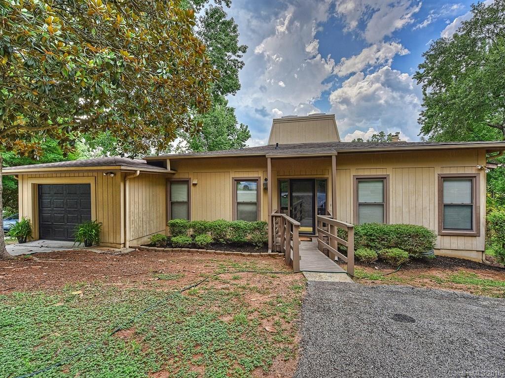 Waterfront at a spectacular price! Great views from this unique home. It has been well cared for but needs updates. You can move right in & update later. Master on main, GR is spacious w/sweeping views of Lake Wylie. Sunroom offers great views & a place to enjoy the sunset. This is a unique home w/asking price that you don't want to pass up.