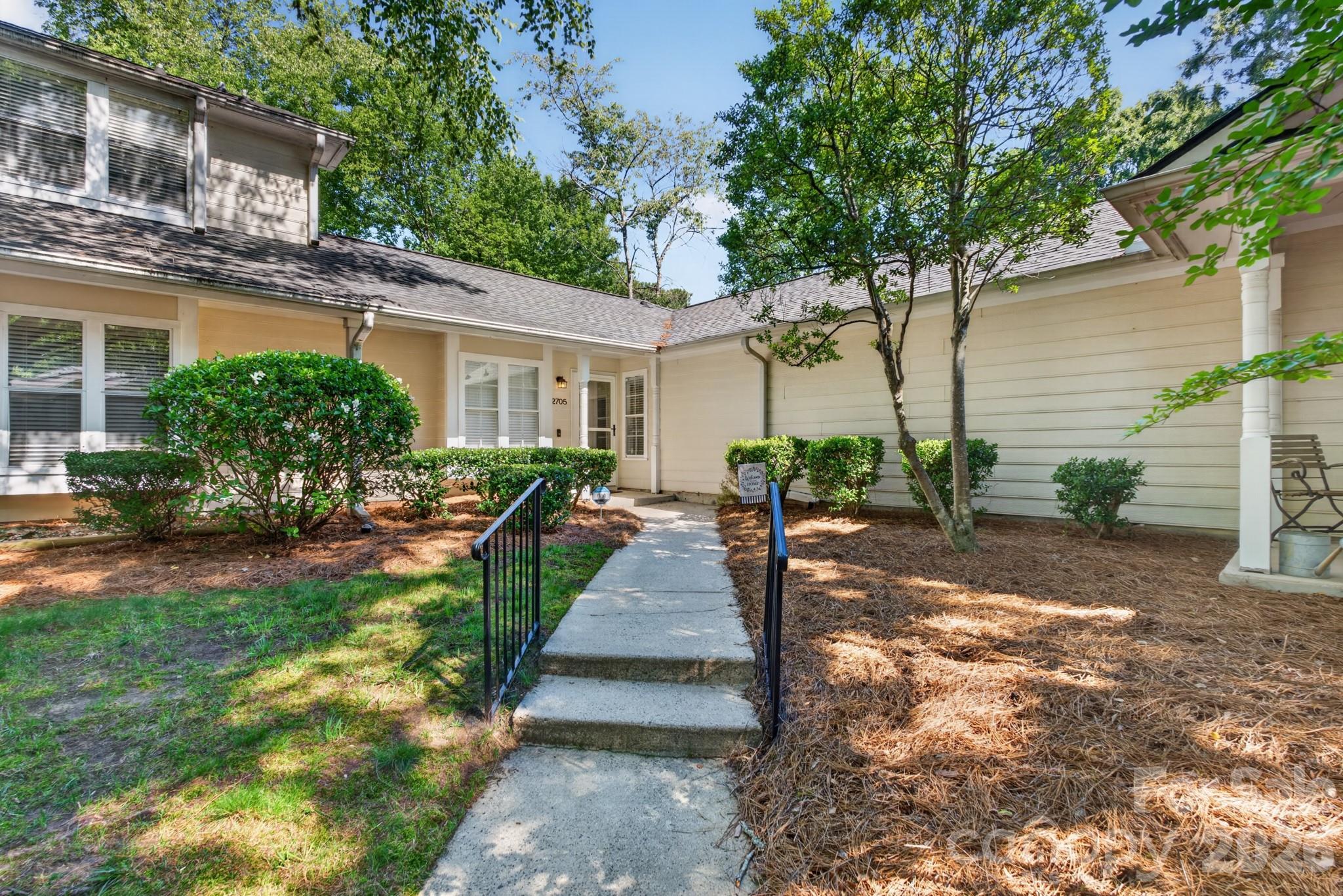 Rare one-story townhome in Hamlin Park offering comfortable, low-maintenance living in an exceptionally convenient South Charlotte location. This move-in-ready 2-bedroom home features a thoughtfully modified floor plan that creates a true primary suite with a private full bath, while the secondary bedroom enjoys direct access to its own adjoining powder room.

Inside, you'll find a bright, light-filled living space with luxury vinyl plank flooring, neutral paint, granite kitchen countertops, NEW cabinetry, quartz bath countertops, and a newer HVAC system. The private fenced patio provides the perfect setting for morning coffee, outdoor dining, gardening, or relaxing with friends and family.

Two assigned parking spaces are located just steps from the front door. Ideally situated within walking distance of Harris Teeter, restaurants, and everyday conveniences, with easy access to SouthPark, Quail Hollow, Uptown Charlotte, and major commuter routes.

Washer, dryer, and refrigerator convey. A rare opportunity to own an affordable, move-in-ready home with single-level living in one of South Charlotte's most convenient locations.