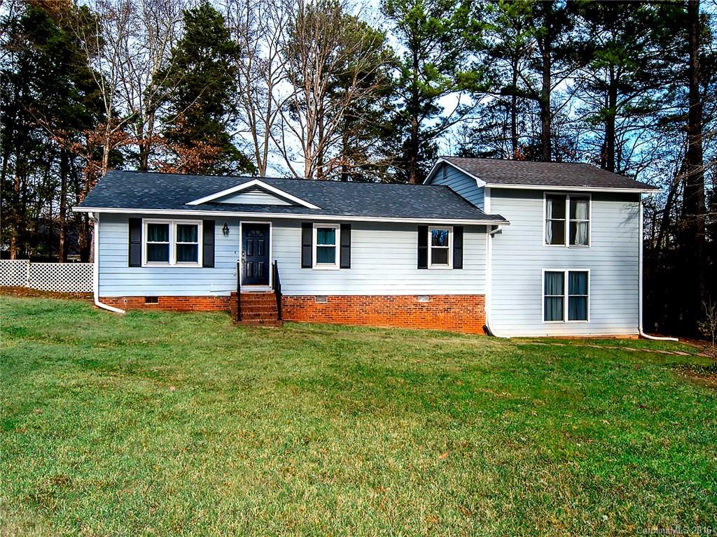 Private Country Living on almost an acre!  Features of this home include stainless steel appliances, tile and wood floor, a large bonus/recreational area downstairs, fenced in yard and plenty of parking.  Come check it out today!