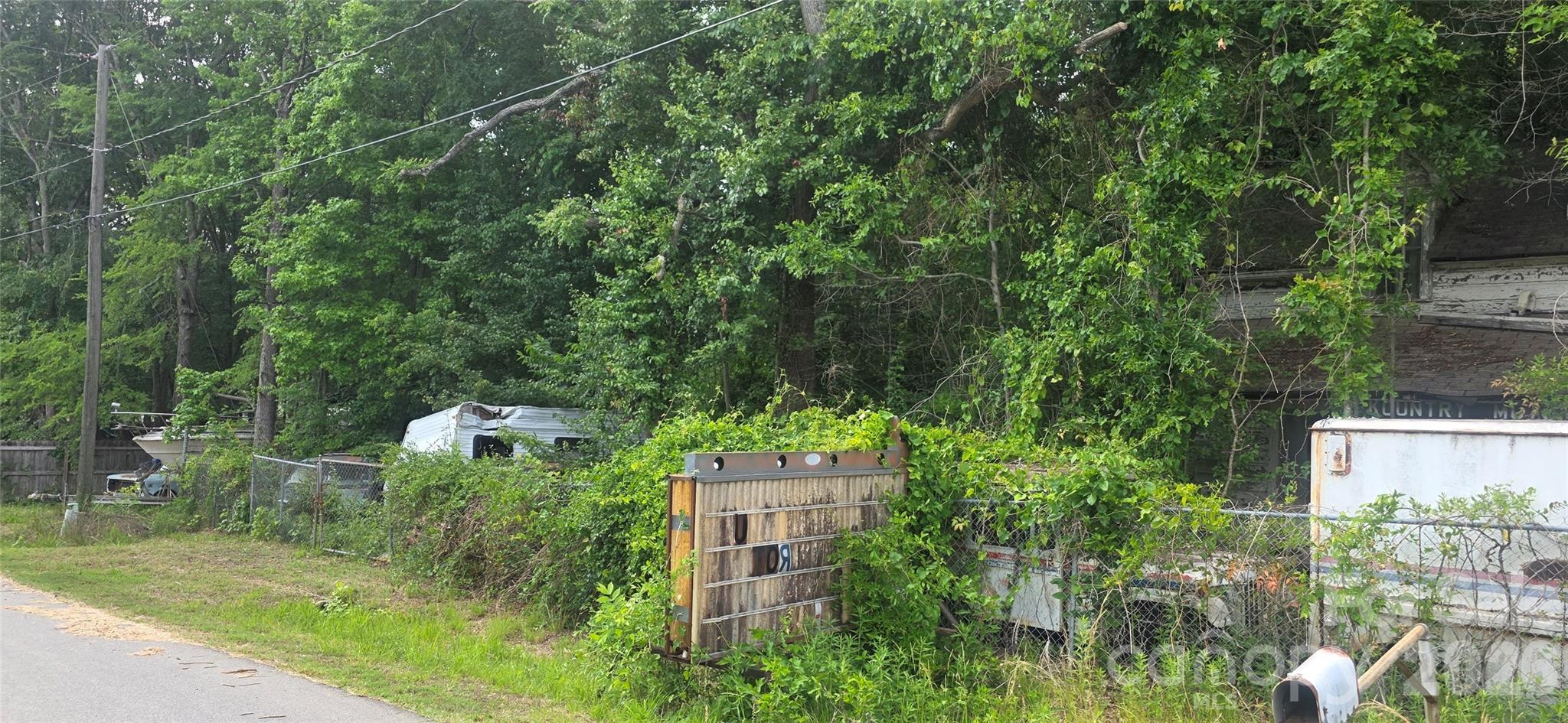 Home has absolutely no value. This would actually need to be a tear down. The sale would be subject to subdivision of the lot. This amount of square feet will be determined by surveyor. Great property location for new construction home In Belmont! Close to shopping and restaurants.