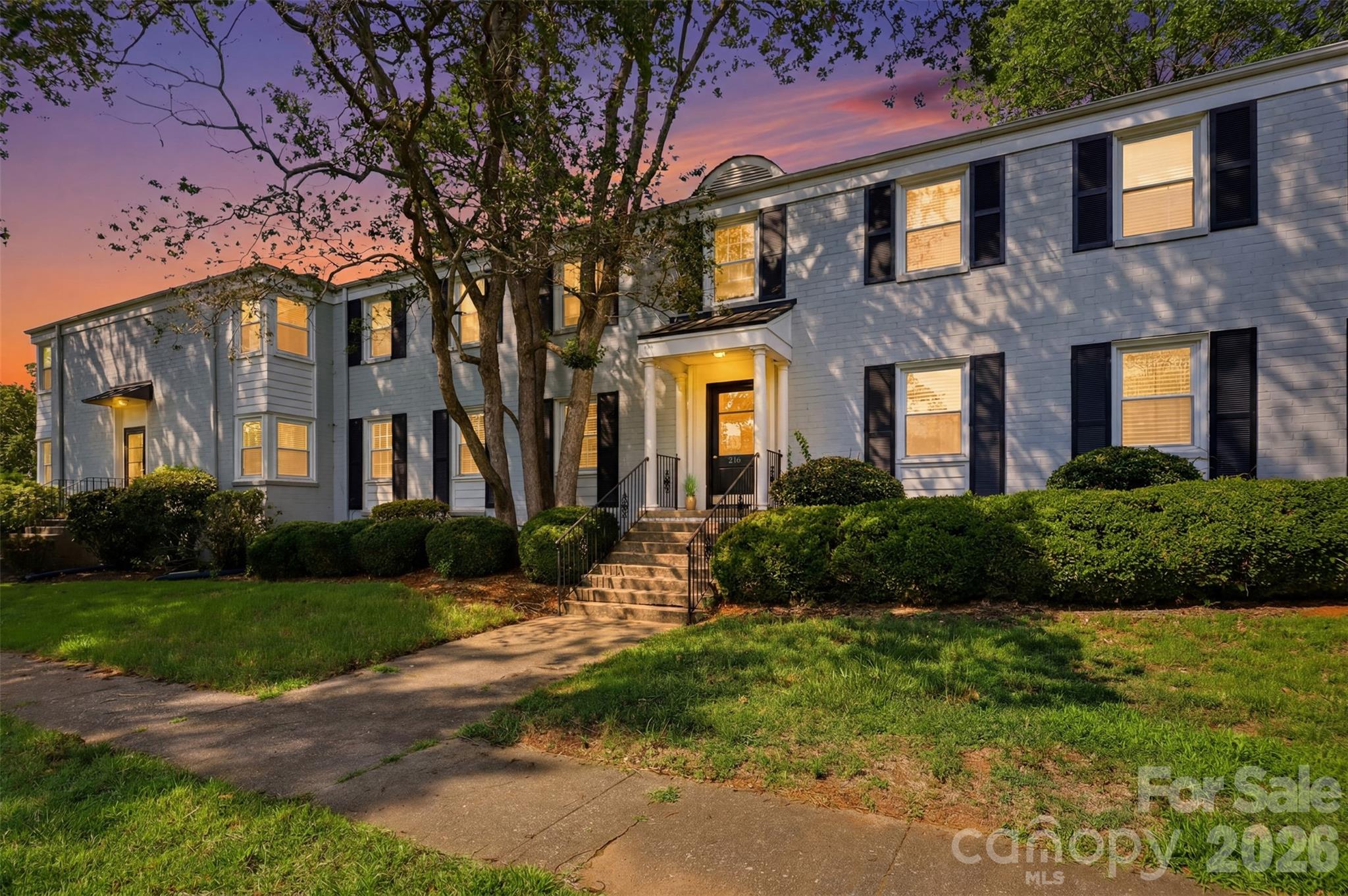 Rare opportunity to own a desirable 2 bedroom, 1 bath main level unit, offering the ease and convenience of one-floor living. Thoughtfully updated with an expanded laundry room, a beautifully renovated bathroom, and extensive custom trim that adds timeless character throughout.  Enjoy relaxing/entertaining in the HOA-approved pebble rock fire pit area, creating the perfect outdoor gathering space. An exceptional combination of charm, comfort, and an unbeatable location, just steps away from the Little Sugar Creek Greenway and within walking distance of Park Road Shopping Center, which offers popular dining, shopping, and everyday conveniences.