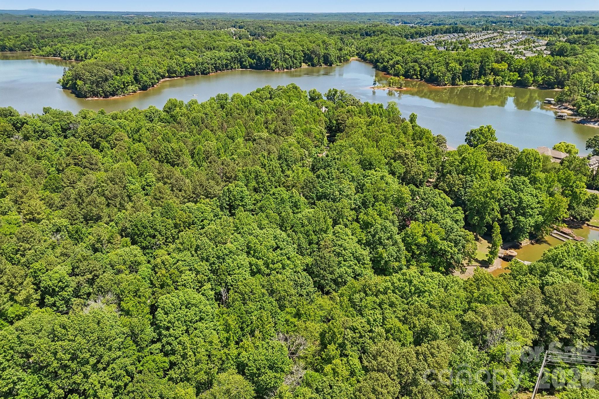 Discover the perfect setting for your future home on this expansive 2.15-acre wooded residential lot, ideally located near the shores of Lake Wylie. Surrounded by mature trees, this property offers exceptional privacy and a peaceful natural setting while still being close to one of the area’s most desirable recreational lakes.

With ample space to design and build, the lot provides flexibility for a custom home, outdoor living areas, gardens, or additional structures. Enjoy the serenity of a wooded retreat paired with convenient access to boating, fishing, and waterfront recreation on Lake Wylie. Whether building now or investing for the future, this property offers a rare combination of natural beauty, privacy, and proximity to lake life.