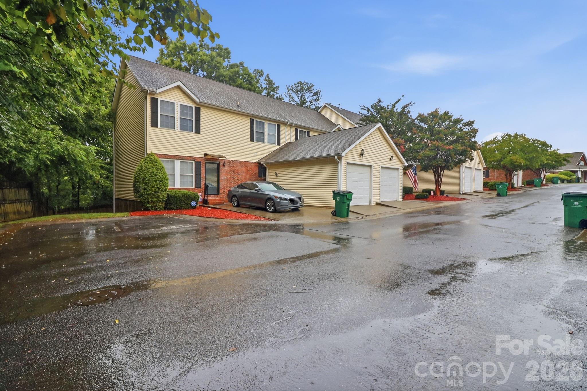 Welcome to this beautifully maintained townhome in the sought-after Adare community! This open-concept home features hardwood floors, crown molding, granite countertops, stainless steel appliances, a breakfast bar, and a cozy gas fireplace. Enjoy two private outdoor living spaces with a deck overlooking wooded views and a lower-level patio. The finished basement offers flexible space for a family room, home office, or gym, plus extra storage. Complete with a one-car garage, additional parking pad, Nest thermostat, and access to the community pool and clubhouse. Conveniently located just minutes from Uptown Charlotte, Charlotte Douglas Airport, I-77, I-485, shopping, dining, and more.