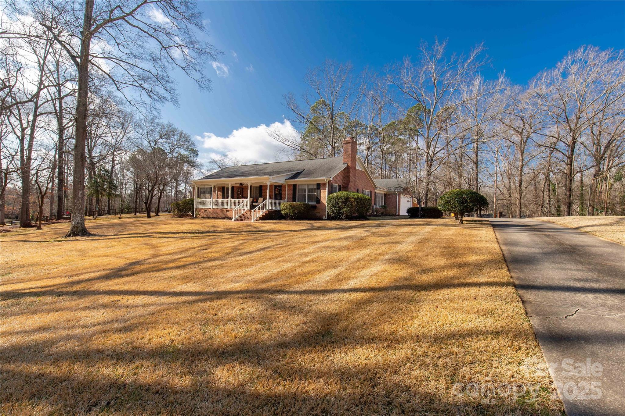 This house is a must see for all it has to offer.  The home is located in a great neighborhood that offers a community pool (there is a fee).  Sits on almost an acre lot with beautiful mature trees, flowers and shrubs.  The home features hardwood floors in living, dining, all bedrooms, flex room and hallway. Home has a large living room that has fireplace with gas logs, beautiful built-in shelves and cabinets. 3 bedrooms and 2 baths. Kitchen is filled with cabinets, counter space, storage, island and dining area. There is also a formal dining room. Large laundry room features additional storage and a sink. There's an additional room off the garage with sink and storage that also has an exterior door.  This opens up to your private outdoor area with hot tub that is beautifully landscaped and has privacy fence. The attic is floored for your storage needs.