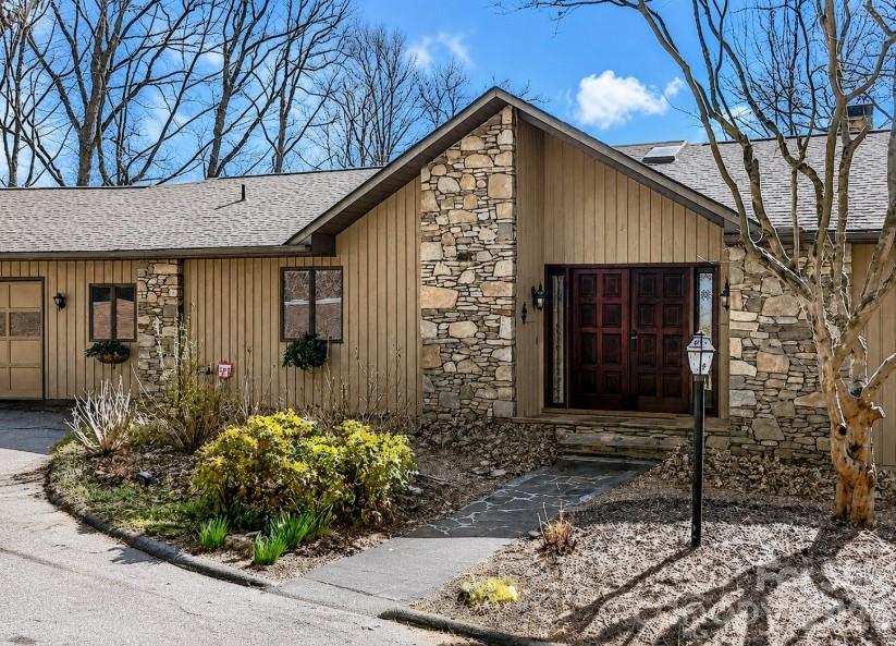 Located in the sought-after mountain community of High Vista, this 3-bedroom, 2.5-bath home combines timeless craftsmanship with a flexible floor plan designed for today's lifestyle. The large main-level primary suite offers everyday comfort, while rich wood finishes throughout create warmth and character from the moment you enter.

The spacious kitchen is the heart of the home, perfect for gathering, entertaining, and everyday living. A dedicated home office provides an ideal space for remote work or quiet productivity.

The finished lower level offers exceptional flexibility with multiple bonus rooms ready to become a home gym, media room, guest space, playroom, or creative studio. A separate hobby or sewing room adds even more versatility.

Step outside to one of the home's standout features: expansive double boardwalk-style decks overlooking winter long-range mountain views. Whether enjoying your morning coffee or hosting friends, the setting is unforgettable. The spacious backyard offers endless possibilities for gardens, a fire pit, or additional outdoor living.

Additional features include a large garage, separate workshop, circular driveway with ample parking, and mature landscaping highlighted by hydrangeas and an American Beauty rose.

Recent improvements include Andersen sliding doors and casement windows, enhancing energy efficiency, natural light, and overall comfort.

High Vista offers optional amenities with a transferable Property Owners Association membership that conveys with an acceptable offer, providing access to community amenities. Golf membership is available separately through Chestnut Mountain Golf Club.

https://highvistapoa.com/
Golf membership through Chestnut Mountain. https://www.chestnutmountaingolf.com/
