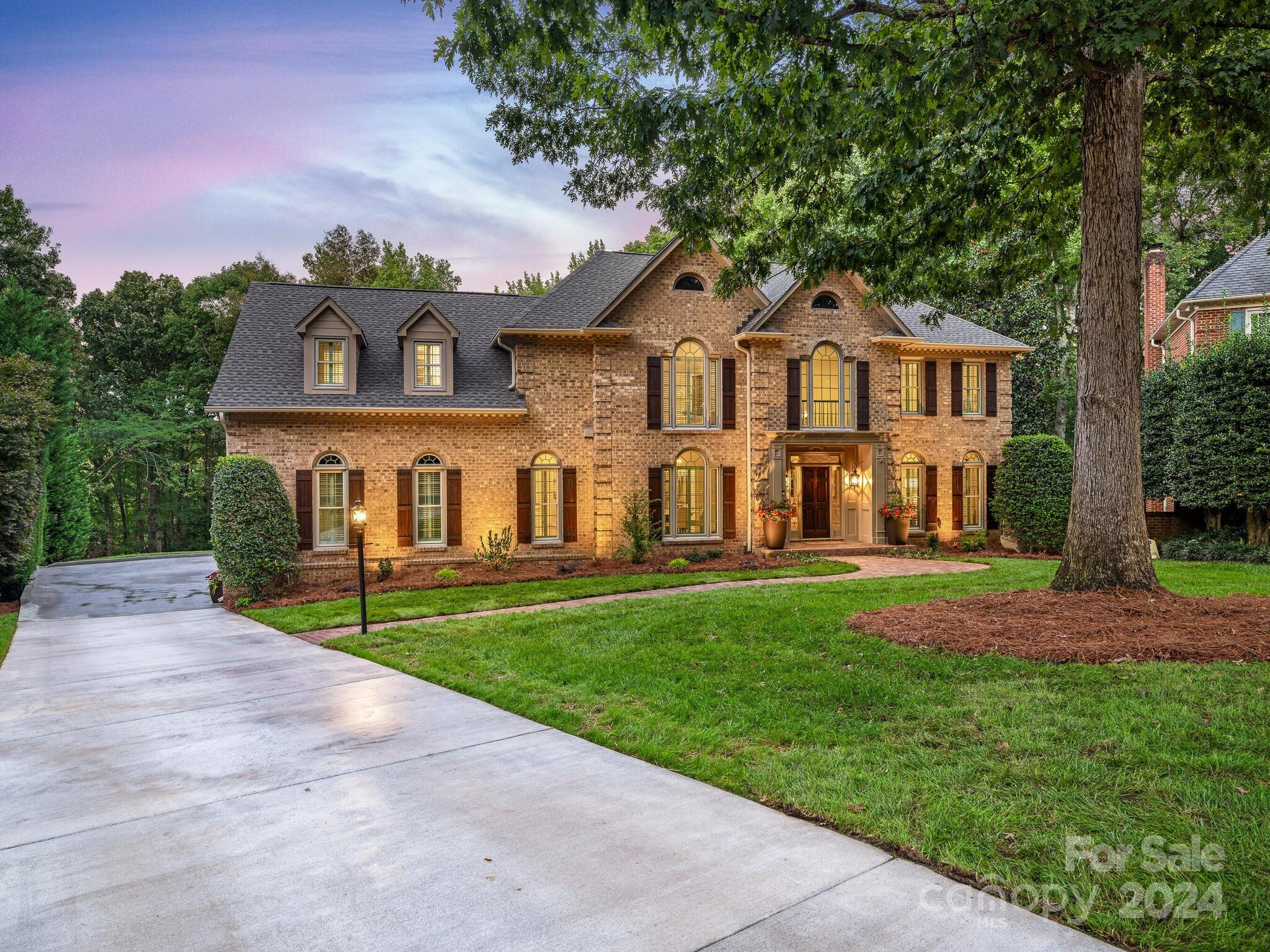 This is truly a rare find in South Charlotte! Huge 1.439-acre CUL-DE-SAC lot with TONS of privacy! This meticulously maintained home will impress you with all of the RECENT UPDATES! Chef's kitchen features quartz countertops & backsplash, Thermador appliances, lg island & breakfast area. The vaulted ceiling sunroom has an abundance of light pouring through the oversized windows overlooking the "PARK LIKE" BACKYARD! The expansive primary suite has a spa like bath w/ free standing tub, large shower and high-end finishes! 3 secondary bedrooms are well sized & feature new hardwood floors! Oversized 5th bedroom can also be used as a bonus room or private office. The fully finished basement is an extension of entertaining space or used as a MULTI-GENERATIONAL area w/ bedroom, full bath, great room with fireplace, bar & recreation room! The PRIVATE BACKYARD OASIS is an ENTERTAINER'S DREAM featuring an OVERSIZED SALTWATER POOL, travertine pool deck, screened porch & sizable deck. 3 car garage!