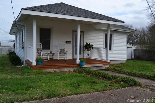 Cute as a button ranch home in Fort Mill. Rocking chair front porch, and beautiful fenced yard. Spacious living area with electric fireplace, cute kitchen w/ nook seating, stainless appliances, and tons of character! Enjoy a cup of sweet tea on the patio overlooking garden! Minutes from downtown. * Age of home is approximate, storage building sld as is.