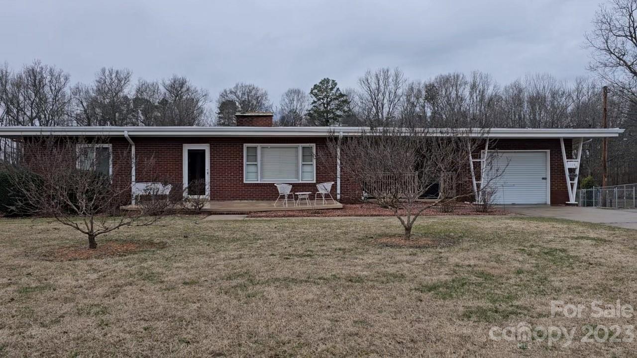 Beautiful brick ranch home just outside of Albemarle. Spacious family room with fireplace. Stainless appliances in the eat-in kitchen. Vinyl flooring throughout living area. 1200 s.f. walkout basement perfect for the hobbiest, and waiting to be finished for additional living. Wood burning stove in basement. Fenced, spacious backyard with a 20x20 two car steel building.