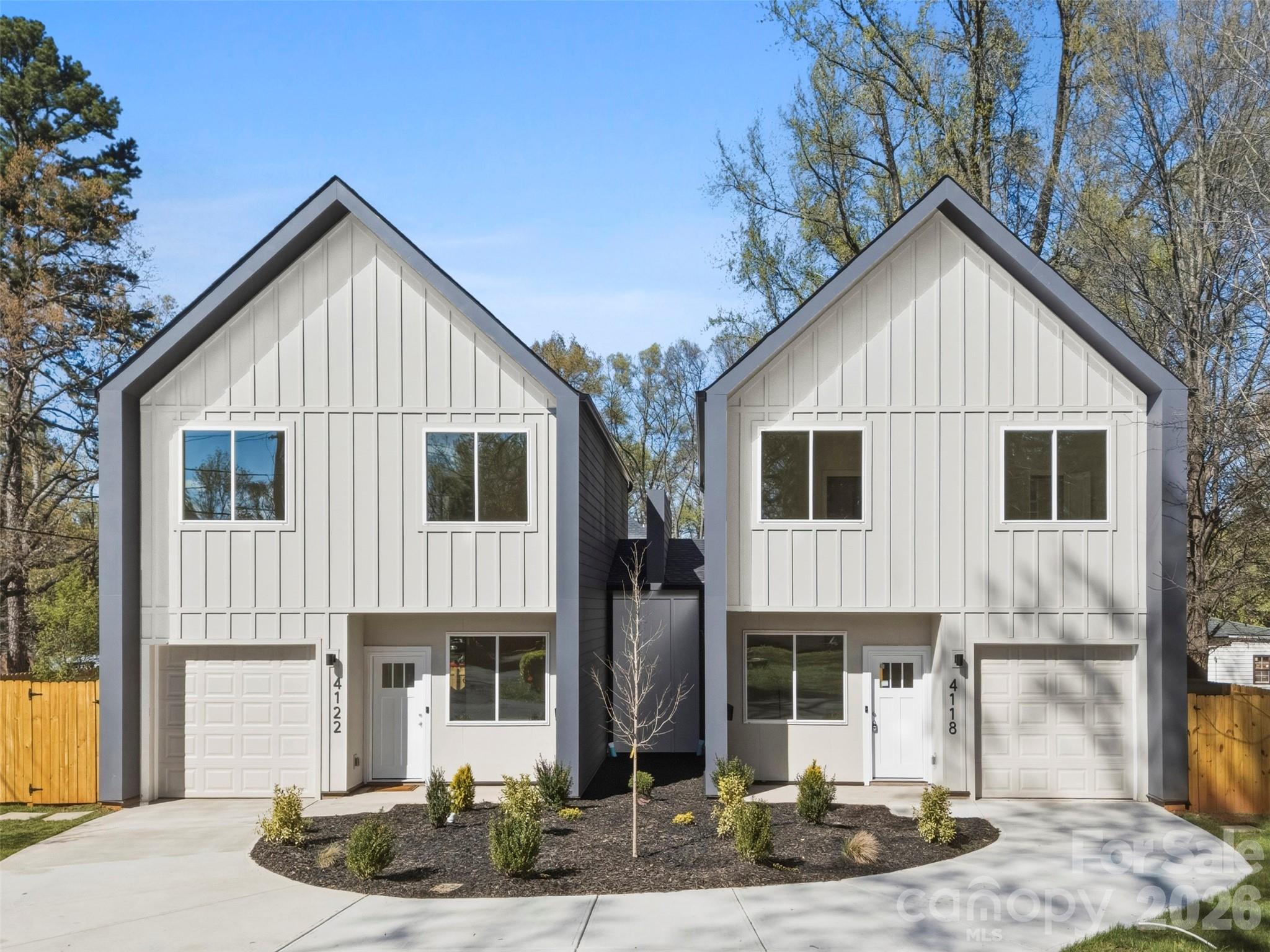Welcome to this thoughtfully designed 3-bedroom, 2.5-bath townhome in one of Charlotte's most exciting neighborhoods. Offering comfortable, well-appointed living space, this home delivers the feel of a single-family home without the price tag.

What truly sets this property apart is its rare duet configuration: while the home shares a wall with its neighbor, it sits beneath its own completely separate roof — giving you the structural independence and long-term peace of mind that attached homes rarely offer. And with no HOA, you keep full control of your property without fees and restrictions.

Inside, the open main level with high ceilings and ample natural light flows seamlessly from the living area to the kitchen, ideal for entertaining or everyday living. The kitchen is equipped with Frigidaire Gallery appliances, a pantry with built-in shelving, and a pot filler for daily convenience.

Three generously sized bedrooms upstairs provide the separation and flexibility every household needs. The primary suite is a true retreat with tall ceilings and large windows. The ensuite bath has been thoughtfully designed with a private water closet and spa-inspired triple showerhead system, offering a customizable shower experience that feels anything but ordinary.

Step outside and you'll find an outdoor living setup that's equally impressive. The private, fully fenced backyard is perfect for pets, play, gardening, or simply unwinding away from the world. A covered back patio extends your living space into the outdoors, providing a shaded spot for morning coffee, evening gatherings, or year-round enjoyment regardless of the Carolina weather.

This home is nestled in one of Charlotte's most energized west-side communities. Enderly Park blends historic charm with new development momentum, and the location puts everything you need within reach. Charlotte Douglas International Airport is less than a 10-minute drive, making it a frequent traveler's dream. A short commute southeast lands you directly in Uptown, Charlotte's Center City.

When you're staying local, the lifestyle is equally rich. Enderly Coffee Company anchors the neighborhood's café scene along Tuckaseegee Road, while the Stewart Creek Greenway, part of the Carolina Thread Trail, connects you to Seversville Park and Irwin Creek Greenway, perfect for walking, jogging, or biking. The namesake Enderly Park itself features a walking trail, tennis courts, basketball courts, a playground, pickleball courts, and a dog park spanning 8 acres.

Opportunities like this don't wait — schedule your showing today.