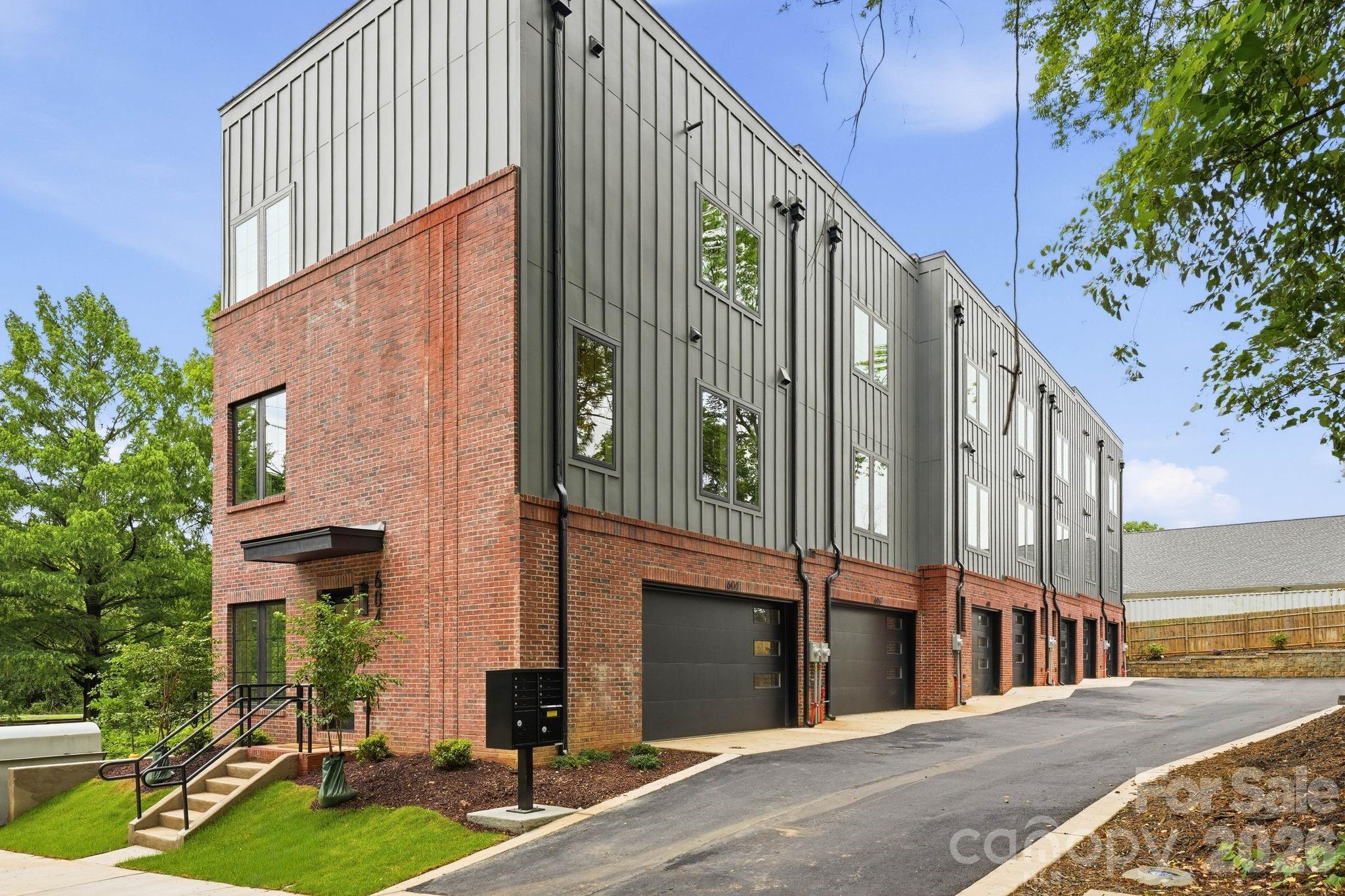 Sophisticated, urban, and beautifully balanced. This townhome awaits you. This modern residence spans over 1,700 square feet and offers two bedrooms, two and a half bathrooms, and double-car garage. The living room features an inviting open concept with high-end features. The kitchen is equipped with a large island for entertaining. Ideally located within minutes of Uptown Charlotte offering incredible skyline views from your rooftop terrace. Situated off the Little Sugar Creek Greenway, this residence is within walking distance to Optimist Hall, light rail, parks, shopping and restaurants.