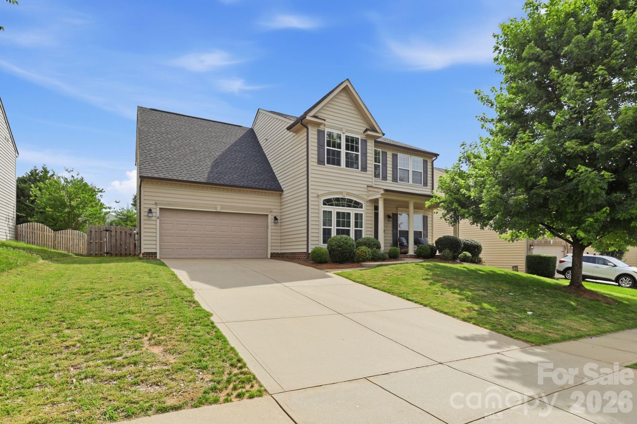 Welcome to 2075 Clover Hill Rd in the highly desirable Indian Land area! This beautifully maintained 4-bedroom, 2.5-bath home offers approximately 2,394 square feet of comfortable living space designed for both everyday living and entertaining. Inside, you'll find a dedicated home office perfect for remote work, a formal dining room for hosting family and friends, and spacious living areas filled with natural light.
The well-appointed kitchen flows seamlessly into the main living space, creating a functional and inviting layout. Upstairs, the generous bedrooms provide plenty of room for family, guests, or additional workspace.
Step outside to enjoy the fully fenced backyard, ideal for pets, play, gardening, or relaxing evenings outdoors. The attached 2-car garage offers ample storage and convenience.
Located in a sought-after community served by top-rated Indian Land schools, this home is just minutes from shopping, dining, entertainment, and major highways for an easy commute. Enjoy close proximity to Ballantyne, Ballantyne Bowl, parks, walking trails, and the many retail and dining options that make this area one of the most desirable locations in the Carolinas. With its excellent location, well-maintained condition, and versatile floor plan, this home offers the perfect blend of comfort, convenience, and lifestyle. Schedule your showing today!