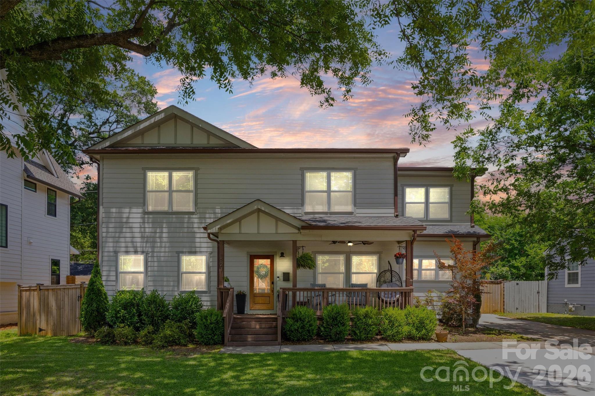 Located in the Plaza Hills neighborhood right next to NoDa, this home puts you just moments away from Charlotte's favorite local galleries, breweries, and restaurants. Completely rebuilt in 2016, the property greets you with a classic front porch that opens into a bright, fluid layout designed for effortless daily living. The main floor feels completely connected and spacious, featuring a living room with detailed coffered ceilings and a gas log fireplace that flows right into the generous dining area. In the kitchen, a central work island, breakfast bar, pantry, and a dedicated reverse osmosis water filtration system connected to both the sink and refrigerator make hosting and cooking a breeze. A practical drop zone keeps the daily routine organized, while two main-level bedrooms offer great flexibility for a quiet home office or guest accommodations. Upstairs, the primary suite serves as a comfortable retreat with its elegant tray ceiling, custom walk-in closet organizer, and an attached bath with dual sinks and an oversized tiled shower. The massive bonus room down the hall provides the ultimate flexible hangout spot for movies or play. Outside, the privacy-fenced backyard features a relaxing patio and a handy storage building. Complete with a tankless water heater, this home combines thoughtful modern upgrades with an incredible neighborhood location. Convenient access to the greenway and minutes from the light rail, dining and entertainment!