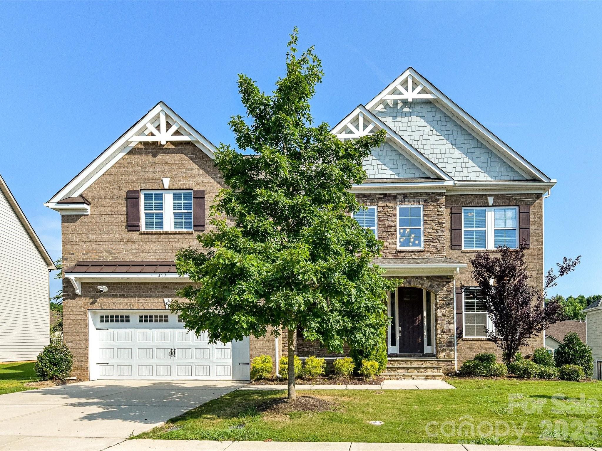 Anything else is a compromise! Boasting over 4400 heated square feet of meticulously designed multi-generational space, CalAtlantic's coveted Waterford floor plan is the perfect balance of gathering spaces and private retreats. This home is among the largest in the neighborhood and is ready for immediate move-in! The covered front porch opens into a dramatic 2-story Foyer where gleaming hardwood floors, new carpet (July 2026), and fresh paint (July 2026) are among the many fine features. A formal Office with french doors provides privacy while the formal Dining Room delivers the ambiance for grand celebrations. The Waterford provides ideal accommodations for extended family, overnight guests: offering TWO generously-sized Guest Bedroom Suites: one on the Main level AND one Upstairs.  The chef-inspired gourmet kitchen is the heart of the home offering Whirlpool stainless steel appliances, an expansive functional island with farmhouse sink, abundant cabinetry, a hallway scullery/prep kitchen AND a dedicated home digital command center: a Skylight wall-mounted calendar. The thoughtfully-designed drop zone creates a space that is equally suited for busy weekday mornings and sophisticated entertaining. Upstairs, the luxurious Primary Bedroom Suite serves as a private sanctuary featuring a spa-inspired bath with an oversized walk-in shower, dual vanities, private water closet, and an impressive boutique-style closet complete with a custom vanity chest. An additional Guest Bedroom Suite, two generously sized secondary bedrooms connected by a shared bath, and a spacious Bonus Room provide exceptional versatility for recreation, media, study, or wellness. Washer/dryer, shelving and sink in Laundry Room.  Enclosed rear porch includes dining furniture. Fenced, level, large backyard complete with a volleyball net and freshly weather-stained playset. Worry-free, fully encapsulated/conditioned crawlspace offers incredible space for storage. Oversized garage with storage galore. RainBird irrigation system. Conveniently located within walking distance of the neighborhood's spectacular resort-like clubhouse, pool and playground. For the family unwilling to compromise on space, quality, or lifestyle, this is more than a home—it's a place where everyday living is elevated and lasting memories are made... Welcome home!