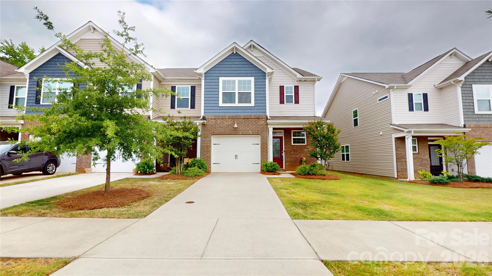 Beautiful 3-bedroom, 2.5-bath end unit townhome in the sought-after Chateau community of Southwest Charlotte that offers modern living with a bright kitchen, large island that fits four for seating, excessive counter and cabinet space open living room and upgraded Plantation Shutters throughout.  The outdoor space has been enhanced with brick pavers, planters and a privacy fence which is perfect way to enjoy the quiet community.  Upstairs features a spacious primary suite with a walk-in shower, walk-in closet with upgraded shelving, while the secondary bedrooms are perfect for family, friends or an office. Each secondary closet also has upgraded shelving, which allows for an organized townhome. Built in 2022, this home includes an attached garage, driveway parking, and stylish finishes perfect for comfortable living or entertaining.  Plenty of parking throughout the community, so guests can enjoy the community pool, cabana and the beauty of the complex.