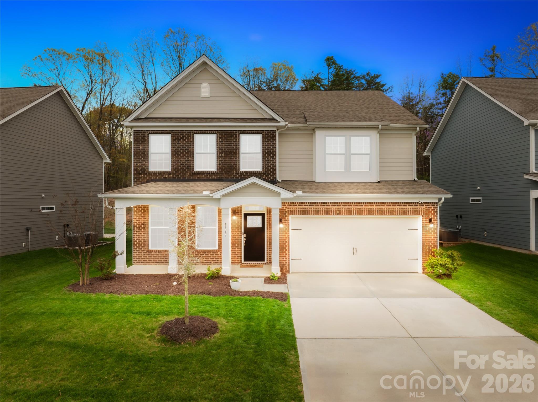 Experience the ultimate blend of luxury and value in this stunning 4-bedroom "Hampshire" sanctuary, nestled in the highly sought-after Avondale community and boasting the rare advantage of low Lancaster County taxes. The sun-drenched, open-concept main level is a masterpiece of design, anchored by a gourmet chef’s kitchen featuring premium quartz countertops, a massive social island, and a butler’s pantry that flows seamlessly into a spacious family room w/fire place and breakfast area. Step outside to your private, covered back porch to enjoy peaceful mornings overlooking a wooded backdrop. Whether you need a secluded home office or a welcoming space for visitors, the rare first-floor guest suite delivers, while the upper level serves as a true retreat with an expansive loft and a spa-inspired primary suite complete with a private sitting area and a massive walk-in closet. This home has Tankless gas water heater. Beyond the home, enjoy a resort-style lifestyle with access to a premier clubhouse, fitness center, and sparkling pool, all while staying just minutes from the elite shopping, dining, and entertainment of Ballantyne.