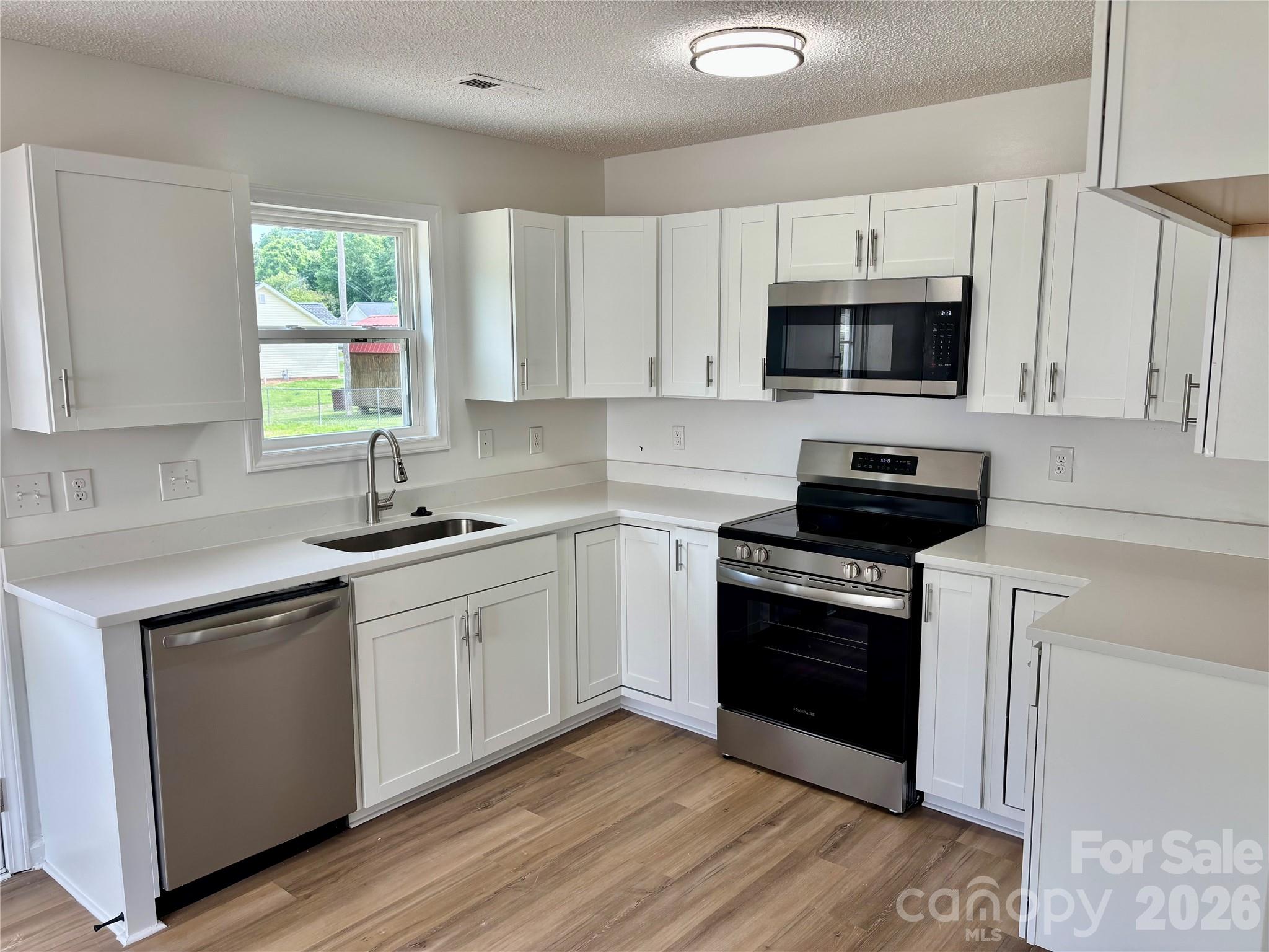Beautifully renovated 3 bed, 2 bath ranch home large lot, with no HOA. Remodeled in April 2026 with new  paint and new flooring throughout. NEW Furnace and AC in 2026. New Windows.  The kitchen shines with new quartz countertops, new kitchen cabinets, new sink, and new range/oven. Primary bathroom new dual sink vanity, sinks, faucets lighting, mirrors and shower. Secondary Bathroom new vanity, sink, faucets & new tub.  Stylish new lighting throughout the entire home.  Premium oversized lot backing to woods. Spacious primary suite and bathroom.
Property is located in USDA Eligible area, allowing for a Zero Downpayment Loan.
*** Closing Cost Credit if buyer chooses to work with Admiral Home Mortgage. Listing agent will provide lenders contact information to the buyers agent upon request.