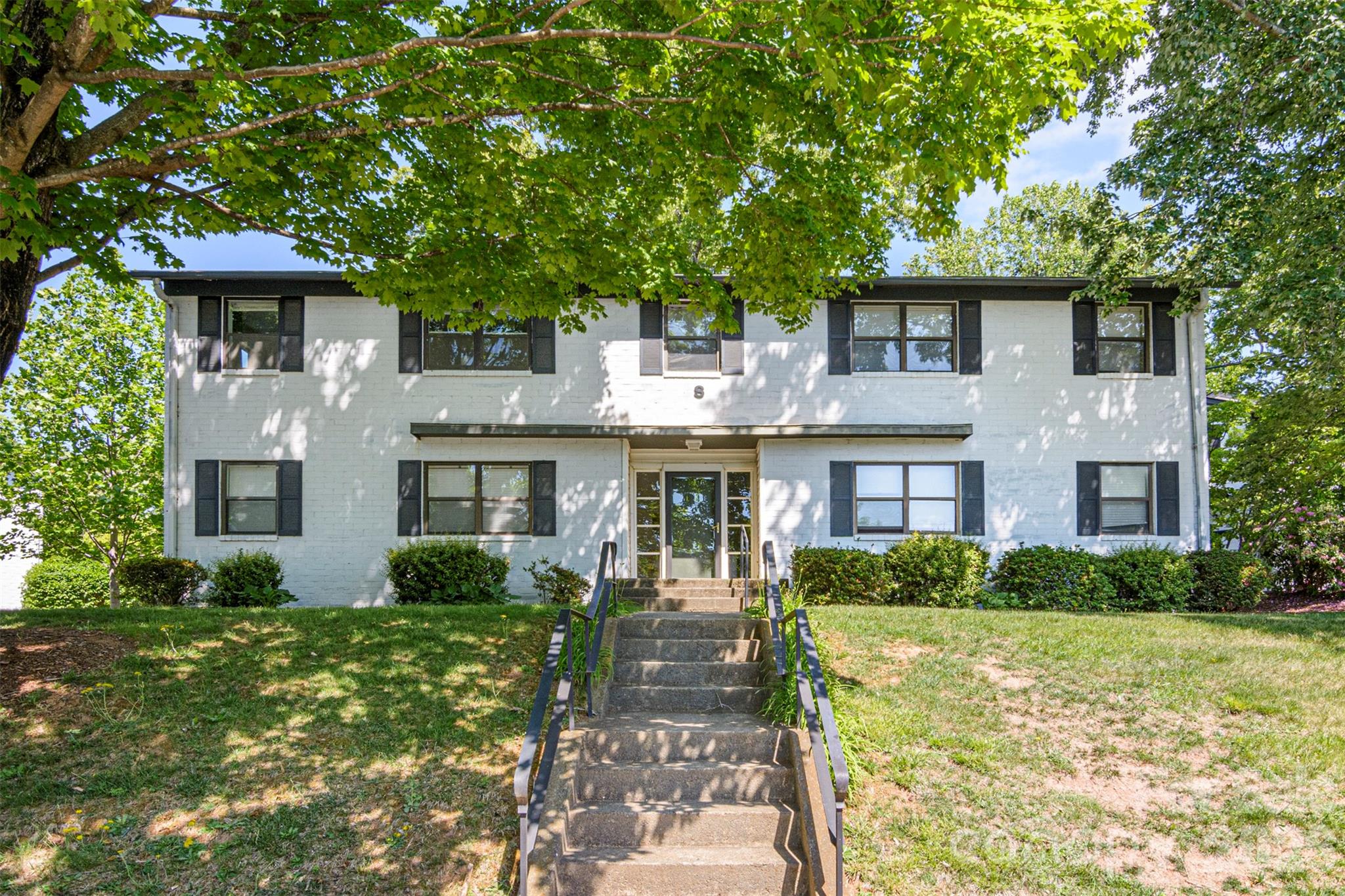Imagine leaving all the maintenance of traditional home ownership behind and just enjoying life! This easy condo has all of the amenities you need! From beautifully-maintained grounds to peaceful, quiet environs, to in-unit laundry and owner-controlled HVAC. You can enjoy all of this while also being close to every single delight that Asheville has to offer! Peace of mind is yours knowing that the HOA fees are low, the management company is masterful, and condo owners may rent their unit with approval. Isn't it time to start living large by living small? A new life of ease and convenience awaits you at Beverly Condominiums!