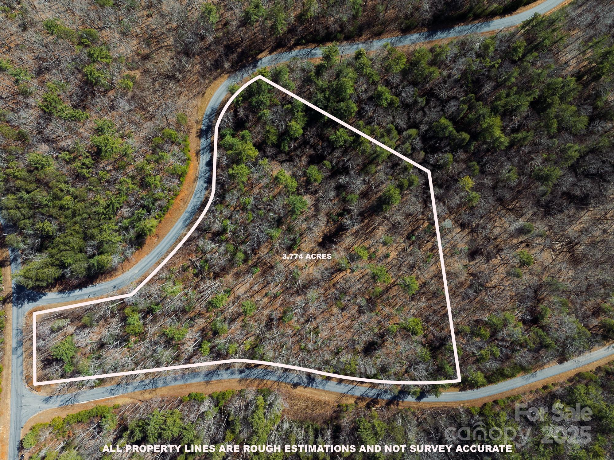 Now priced to move! Impressive 3.774-acre wooded lot with deeded boat slip in the Arbor at Lake James. Situated on a corner lot between High Trail Drive, Turning Leaf Drive, and Larkhaven Drive, this prime lot is only a quarter-of-a-mile to the community pavilion with outdoor fireplace and boat slips, offering ultimate convenience. The Arbor is renowned for its meticulously maintained common areas and scenic open spaces that blend seamlessly with the natural beauty of the mountains, lake, and forest. An idyllic setting to build your dream home in a peaceful, picturesque community. **Dock Special Assessment fee of $10k to rebuild community docks has been paid by current owner.** Construction should being in February and be completed in May.