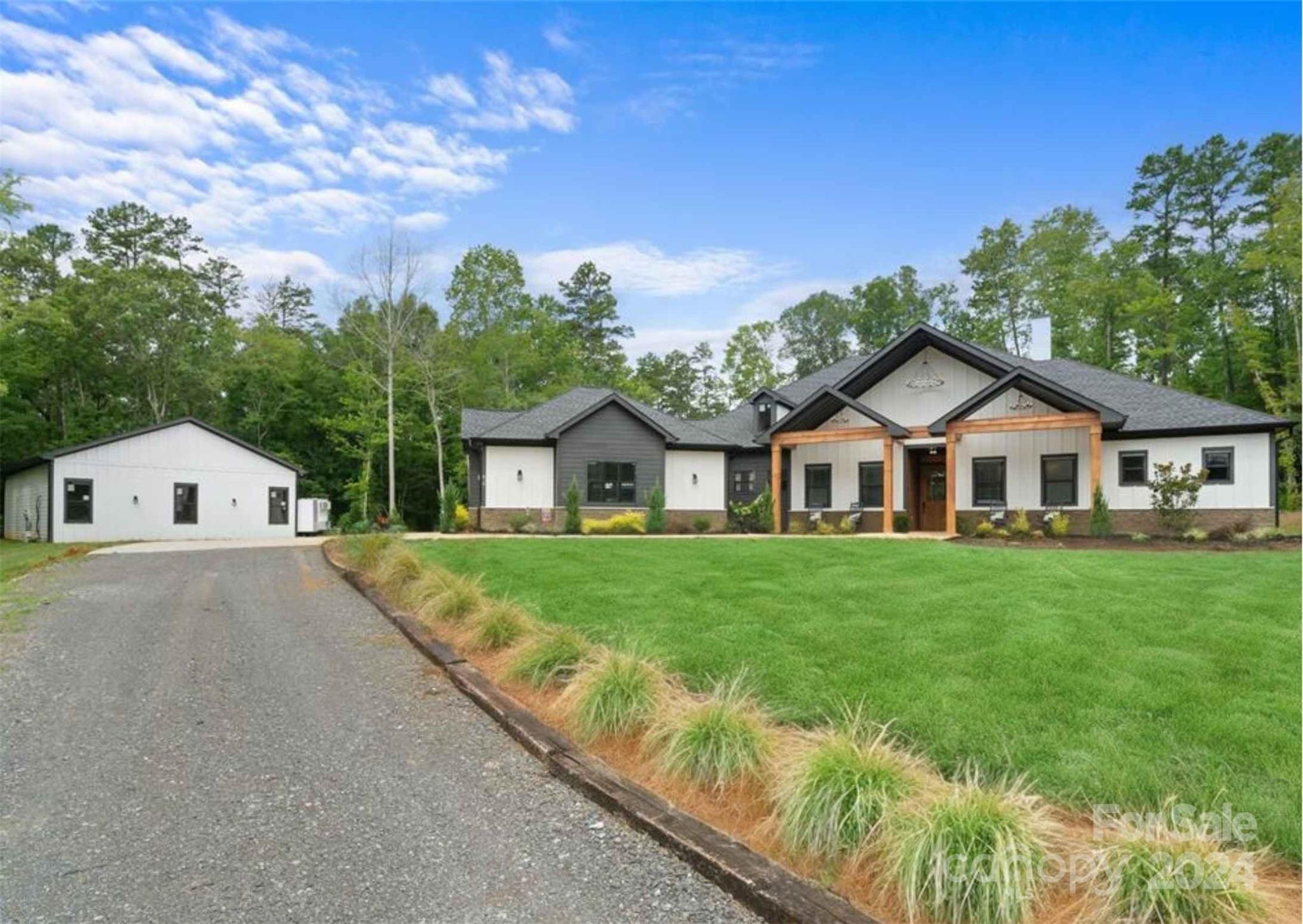 Nestled on over 12 acres, this luxury retreat offers unparalleled privacy and serenity. The long 1,000 ft, tree-lined driveway leads to a fenced-in oasis featuring a stunning pool, an additional doggie fenced area, and a separate shop that could offer a secondary living quarters. The home boasts 3 bedrooms, 3.5 bathrooms, a home office, and a bonus room, which could easily become a 4th bedroom with the addition of a closet. Enjoy custom features like a hidden walk-in pantry, separate coffee bar, a dog room with built in dog wash, a soundproof media room with podcast wiring, and a unique primary bathroom with dual water closets with one toilet and a separate urinal. The kitchen is equipped with a 60" built-in Forno convertible refrigerator or freezer. The coffee bar has a built in ice maker as well as the hidden microwave, and a roomba docking area. 

Home perced for 4 bedrooms. 
Home appraised for $1.63m 8/2024 but sellers are pricing aggressively due to lawn needing attention.